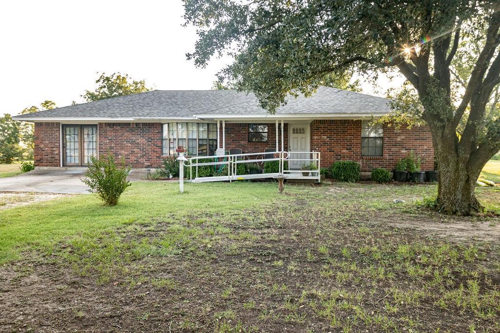 Equestrian-Friendly Country Oasis – 80+ Acres with Home, Barn, Ponds & Gardens Near 
Historic Hubbard, TX 
Discover the perfect blend of country charm and equestrian potential on over 80 acres, partially 
wooded for privacy and recreation. This 2,308 sq. ft. home, built in 1988, offers 3 bedrooms, 2 
baths, a galley kitchen with all-electric appliances and natural wood cabinets, a brick fireplace in 
the living room, and a large bonus room with abundant outlets. A screened-in sun porch provides 
year-round enjoyment, and a new heavy-duty 30-year shingle roof was installed in May 2025. 
A long private circular driveway leads directly to the home and shop. The detached barn-shop 
includes water inside and out, 220V outlets upstairs and downstairs, and large barn doors for 
easy access. A lean-to shed attached to the barn provides excellent covered storage for a boat, 
tractor, or equipment. An attached greenhouse, raised garden beds in the backyard, several fruit 
trees, and mature pecan trees create a true farm-to-table lifestyle. 
Fertilized pastures produced over 100 round bales of coastal bermuda hay in August 2025. Three 
stocked ponds with bass, perch, and catfish provide excellent fishing and attract dove and duck 
for hunting. Expansive flat areas are ideal for building a riding arena or corral—making this 
property a dream for horse lovers. Here, you can wake up to breathtaking sunrises, end your day with stunning sunsets, and enjoy 
dark, star-filled skies at night. Conveniently located between the I-45 and I-35 corridors, with 
easy access to Waco, Corsicana, Dallas, Fort Worth, Austin, and Houston.