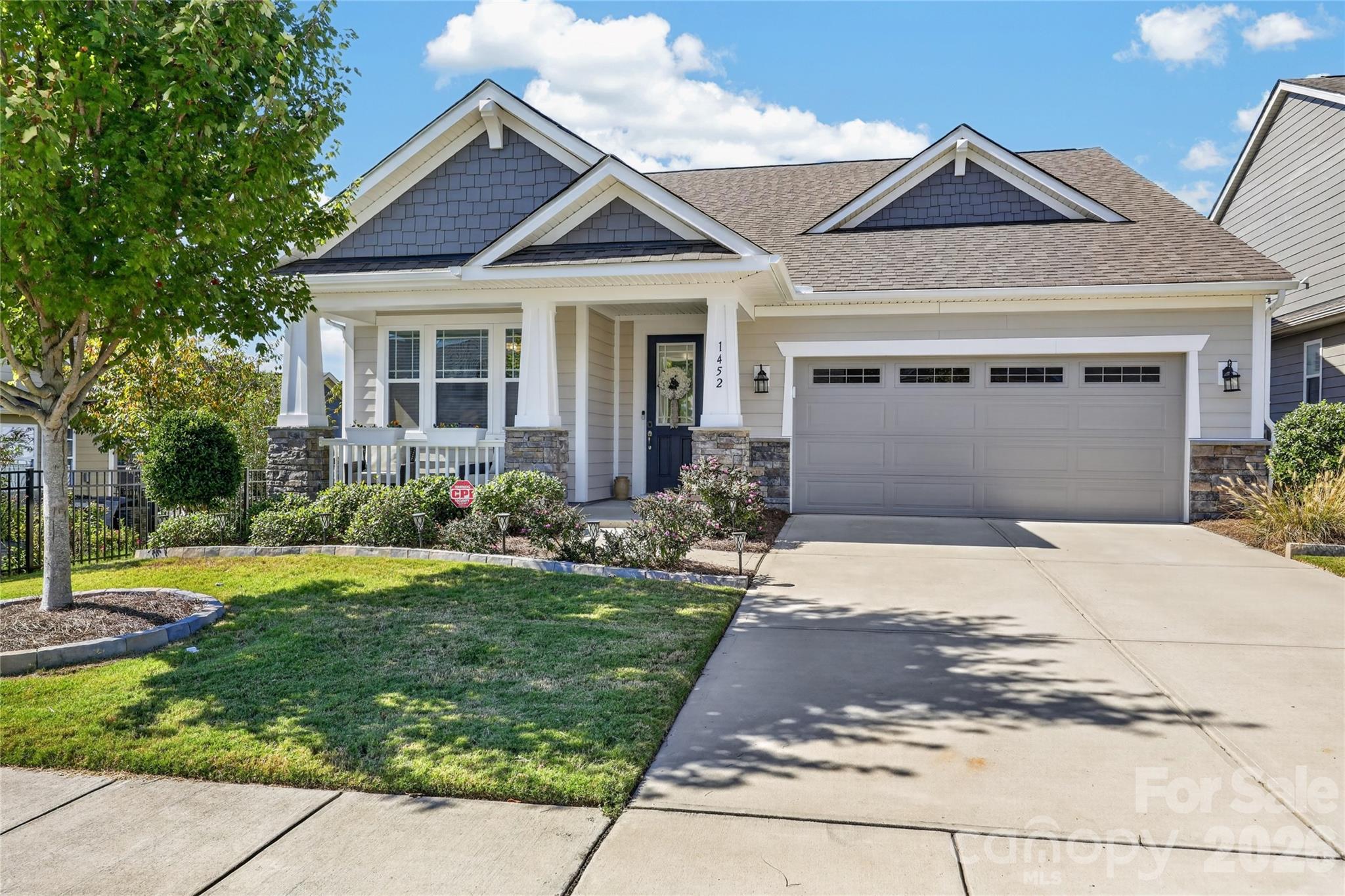 IMMACULATE, ONE-LEVEL HOME in Sought After Cadence - Tega Cay Community With Pool & Top Schools! Enjoy the Easy Life With NO STAIRS... Where LAWN MAINTENANCE PROVIDED BY THE HOA Leaves More Time for Neighborhood Walks... Poolside Afternoons and Days on Lake Wylie!!! Fabulous Curb Appeal... Rocking Chair Style Front Porch Surrounded By Beautiful, Mature Landscaping! Front Entry Hall Leads to the Bright, Gourmet Kitchen and Large, Curved Island With Quartz Countertop, Breakfast Bar Seating, Farmhouse Sink and Designer Glass Pendants. White Tile Backsplash and White Cabinetry Features Rollout Shelving and Storage Galore... Plus Additional Storage In the Island!!! There's Also an Incredible Walk-In Pantry With Custom Built Wood Shelving Thoughtfully Designed For Maximum Storage. Gleaming, All Stainless Steel Appliances Include 5-Burner Gas Cooktop With Stainless Hood, Dishwasher, Wall Oven + Microwave, and Side-by-Side Refrigerator/Freezer With Ice Maker. The Large Dining Area Conveniently Opens to Kitchen and Family Room, Making Entertaining a Breeze! Half Bath Easily Accessed Off Kitchen and Front Entry Hall. Adjacent to the Family Room is a Den/Sitting Area that Leads to a Wonderful Screened Porch With Adjustable Shades For Privacy and Light Control. The Porch Opens to a Handsome Paver Patio Framed by Mature Evergreen Landscaping Offering an Inviting Setting for Morning Coffee... Outdoor Dining... or Relaxing at Sunset. Spacious Primary Suite With Custom, Walk-In Closet You Will Love! The SPA-LIKE, En-Suite Bath Boasts Huge Vanity With His/Her Sinks + Loads of Storage and Private Water Closet. Oversized Shower With Zero Curb Entry... Bench Seating... and 3 SHOWER HEADS... Overhead Rain Shower + Wall Mount + Handheld Spray!!! Laundry Room Is Generously Sized With Storage. Large Second Bedroom Also Features a Walk-In Closet and is Located Next to 2nd Full Bath With Tub/Shower Combo, Full Tile Surround With Shelving, Wall Mounted Shower Head + Handheld Shower Spray. Third Bed/Bonus Room With French Doors Can Also Serve Beautifully as an Office, Exercise or Hobby Room. Extra Deep 2-Car Garage is Fully Finished With Painted Walls, Remote Garage Opener and Storage Shelves. Cadence Amenities include Fantastic Neighborhood Pool... Clubhouse/Cabana... Recreation Area... Walking Trails... Sidewalks... Street Lights... and Numerous Social Events. Convenient Location Near So Many Extras including Shops, Restaurants, Parks, Medical, Entertainment, Lake Wylie Boat Ramp + Paddleboard/Kayak Launch, & I-77 Access!  Enjoy Tega Cay's Premium Lifestyle Everyday With Nearby RESORT-STYLE AMENITIES Including Beach, Marina, Golf, Tennis, Playgrounds, Parks & More!  Zoned for GOLD HILL ELEMENTARY, GOLD HILL MIDDLE and FORT MILL HIGH SCHOOL!!! Nearby, 62-Acre Catawba Park–Tega Cay (approx 1 mile) features Five Lighted Baseball, Softball and T-Ball fields... Three Lighted Multipurpose/Soccer Fields... Playground... and Extensive Walking Trails. Nearby Nivens Creek Boat Landing (less than 1 mile) Provides Public Boat-Launch Access Directly Onto Lake Wylie for Boating, Fishing, Paddling and Access to Waterfront Restaurants. Enjoy 27 Holes of Public Golf at Tega Cay Golf Club, Along With Area Tennis, Pickleball and Waterfront Parks. This ENERGY STAR CERTIFIED, Pristine Home in the Heart of Tega Cay is a Rare Gem with So Much to Offer!!!