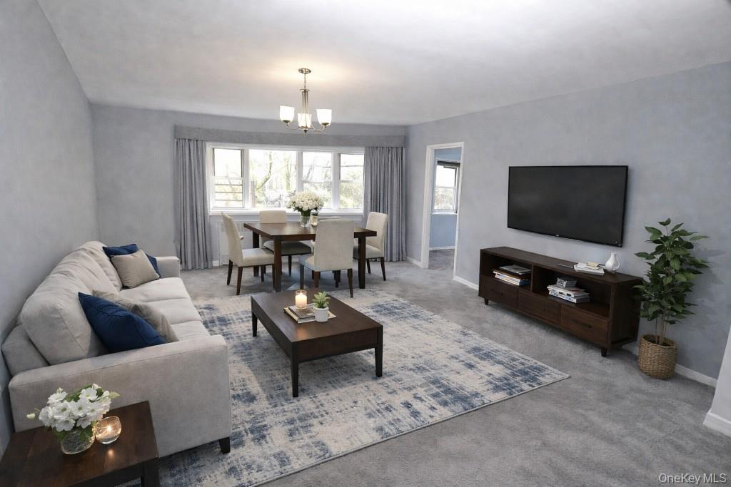 Welcome home to this top floor, bright and inviting two-bedroom, dog-friendly co-op with the added convenience of your own deeded parking space. This move-in-ready home features a beautifully renovated eat-in kitchen with granite countertops, stainless steel appliances, and rich rosewood cabinetry—perfect for everyday cooking or casual dining.  The updated bathroom offers clean, modern finishes, while the spacious living room provides flexibility for both relaxing and entertaining, all set against gleaming covered hardwood floors throughout.  The primary bedroom is generously sized to accommodate a king-size bed and additional furniture and includes a full wall of closets. The second bedroom, a sunny corner room, is ideal for guests, a home office, or nursery.  Enjoy the ease of parking in your own assigned deeded space, laundry conveniently located on the first floor, and a location that truly delivers—just a five-minute walk to the Hartsdale train station and nearby shopping, with a 30-minute commute to Grand Central Terminal.  Maintenance does not reflect STAR credit. Two cats are permitted or one dog under 25-lb weight restriction. Parking space #304