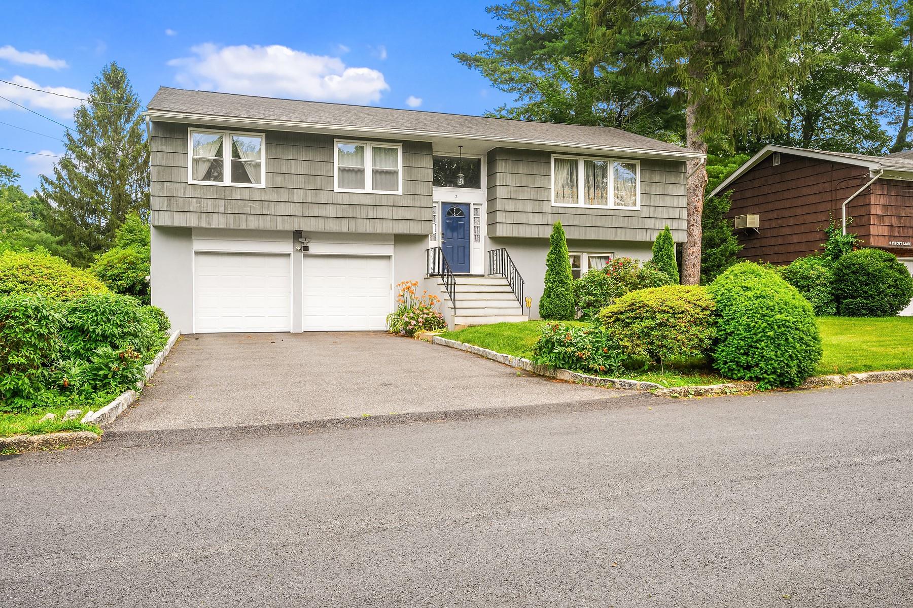 Beautifully Updated Split-Level Home with Spacious Layout and Modern Upgrades
Welcome to this inviting 4-bedroom, 3-bath split-level home on a double cul-de-sac, in the sought-after Poet’s Corner section of Hartsdale, offering comfort, style, and space for the whole family. The main floor features a bright, open layout with a fully renovated kitchen with modern finishes, granite countertops and stainless steel appliances, including a French-door refrigerator. The kitchen is open to a lovely large dining space, which is perfect for entertaining. In addition, there is access to a generously sized outdoor deck, ideal for grilling and al fresco dining. The living room is expansive and filled with natural light, thanks to a prominent triple window, drawing in sunlight throughout the day and is spacious enough to accommodate several different seating areas. Central air ensures year-round comfort.
The king-sized primary bedroom includes an en suite bath and two generous closets, creating a private retreat. Two additional light-filled bedrooms on the main level, each with a double closet, share a well-appointed hall bath with double sinks—ideal for busy mornings. There is also a pull-down attic which spans the entire length of the house, which allows for tons of storage space.
Downstairs, the expansive lower level boasts a large, open living area with two deep, walk-in storage closets, a spacious fourth bedroom, a full, renovated bath, and a laundry room with a second, separate entrance to the backyard. Sliding glass doors lead to a covered patio and a level, fully fenced in backyard—perfect for outdoor gatherings and relaxation. There is also an entrance to the 2-car garage.
This thoughtfully updated home combines functionality and style, offering flexible spaces to suit your lifestyle.