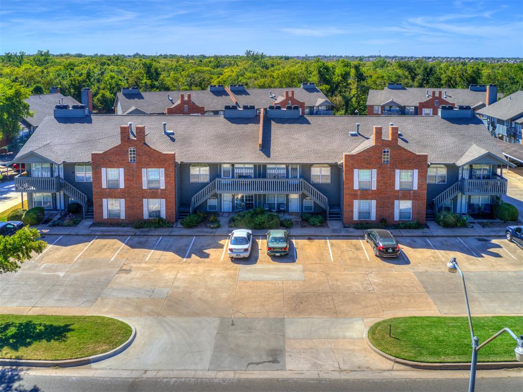 GREAT LOCATION! Welcome to Forest Pointe, ideally situated just north of Lake Hefner and mere minutes from the outdoor recreation of Bluff Creek Park, featuring nature trails, play areas, covered pavilions, and expansive green spaces. This well-maintained lower-level condominium is conveniently located near the front of the complex, offering easy access to the park and community amenities. Features include 1 bedroom, 1 bathroom, front-row or nearby covered parking, and access to the community pool. The spacious living area features vinyl flooring and a cozy wood-burning fireplace, creating an inviting atmosphere. The kitchen offers abundant counter space and storage, along with a dishwasher, microwave, and newly installed oven. The freshly painted bedroom has new carpeting, a large window with a charming window seat, and a generously sized closet. Adjacent to the bathroom, you'll find the utility area with a washer and dryer, plus additional storage space. The HOA covers exterior maintenance, water, trash service, parking, and the community pool, providing low-maintenance living. Located in Northwest Oklahoma City, this home offers convenient access to shopping, dining, entertainment, and major commuter routes. Schedule your showing today!