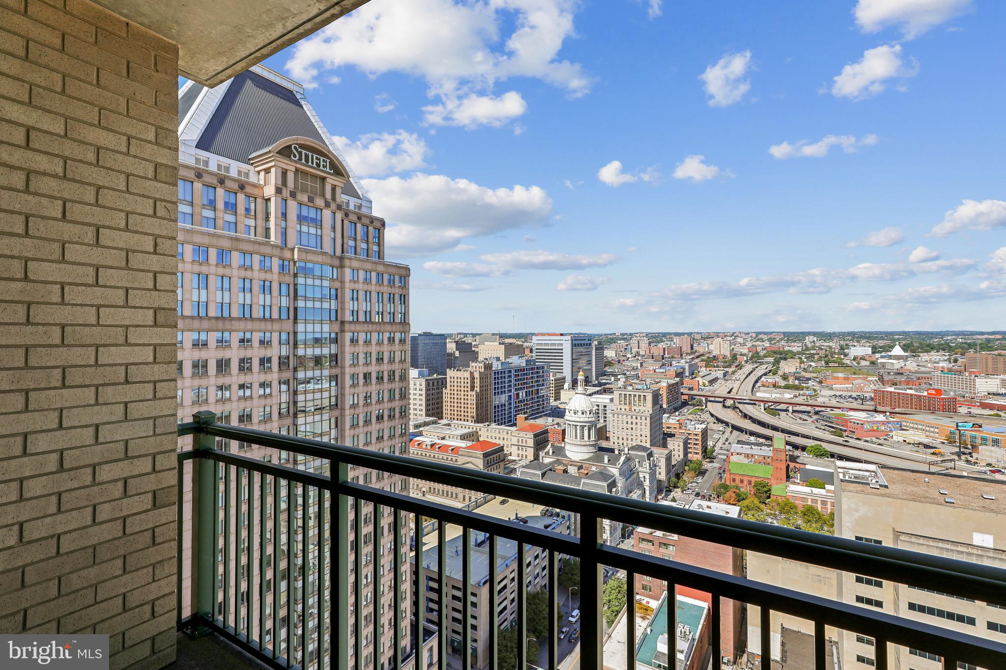 Wake up to breathtaking Baltimore skyline views from the 30th floor in this immaculate condo featuring rare oversized garage parking and resort-style building amenities. This immaculate unit offers wood flooring in the main living area, soft Berber carpet in the bedroom, and an updated kitchen with granite countertops and GE stainless steel appliances. An in-unit washer and dryer adds everyday convenience. Step onto the private balcony to take in sweeping city views with your morning coffee or unwind at the end of the day.The unit includes a rare oversized reserved garage parking space—approximately 1.5 spaces—large enough for a car and motorcycle. Condo fee includes gas, water, and sewer, and the home features gas heat, cooking, and hot water.Residents enjoy exceptional amenities including a 24-hour concierge, fitness center, pool, hot tub, business center, and game room. Ideally located just minutes from downtown, restaurants, museums, and Baltimore’s vibrant waterfront. Easy, low-maintenance city living with incredible views.