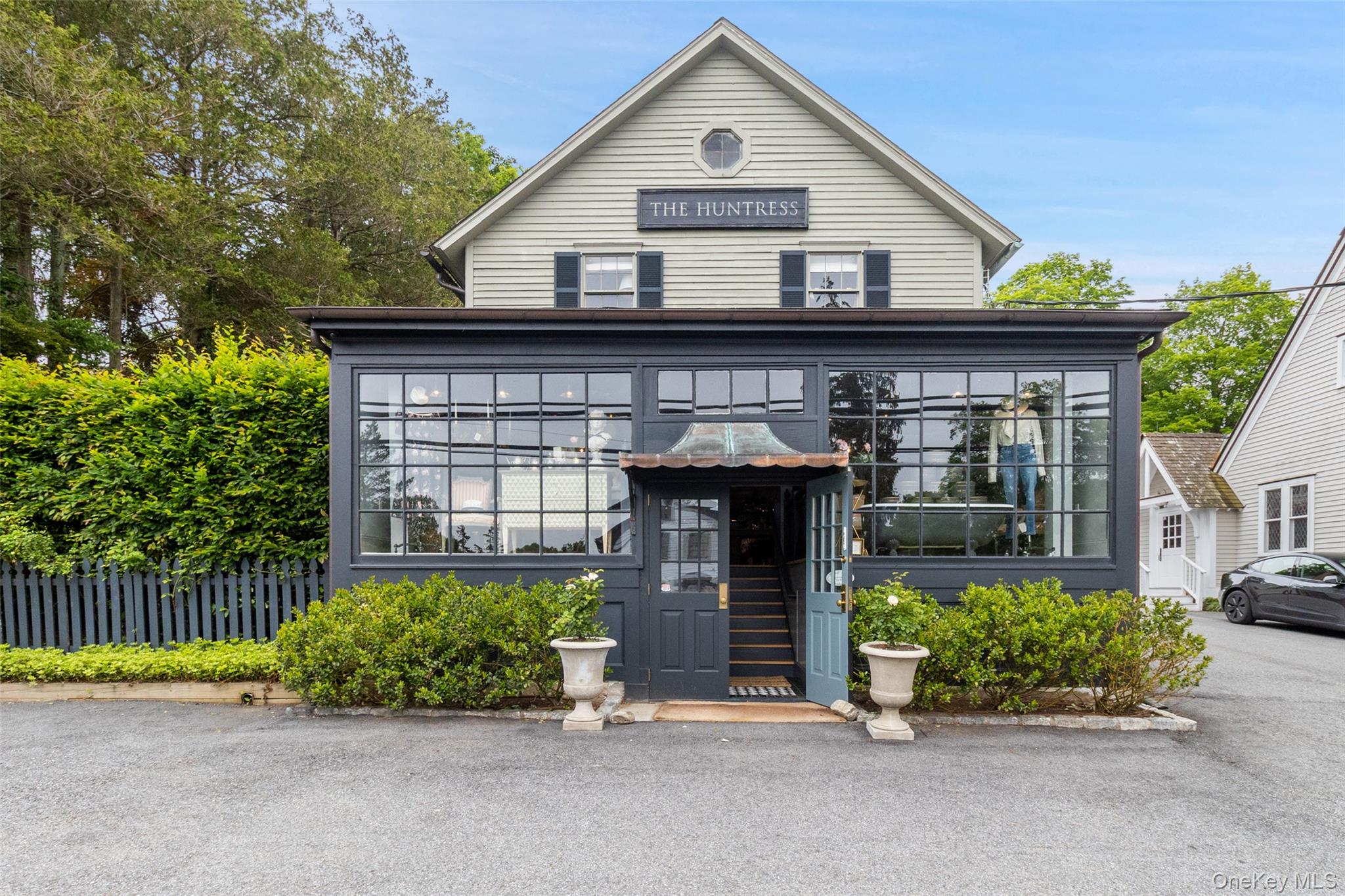 Rare Mixed-Use Opportunity. 259 Westchester Avenue is part of Pound Ridge’s rich past. Located in the heart of the historic hamlet, it was the former Samuel Parker house. Built in 1860, this mixed-use building has housed the old Schelling’s Market, as well as the Samuel Parker Caf&#233;. It currently is home to The Huntress, a high-end design and retail store. Located across the street from Jean George’s Inn at Pound Ridge, this unusual offering enjoys high visibility near the intersection of Routes 124 , 172 and 137. It is situated next to the town-owned Conant Hall and close to the Hiram Halle Library as well as the Pound Ridge Historical Society.  The property, a .27-acre parcel, has on-site parking in front and behind the building. Completely renovated with new HVAC,electric,water and generator in 2017.The property has two buildings: the main retail space with beautifully renovated three-bedroom apartment and a large studio/storage barn. A beautifully landscaped side yard with terrace, seating areas and raised bed gardens is accessible to both the retail space and the apartment. A remarkable offering!