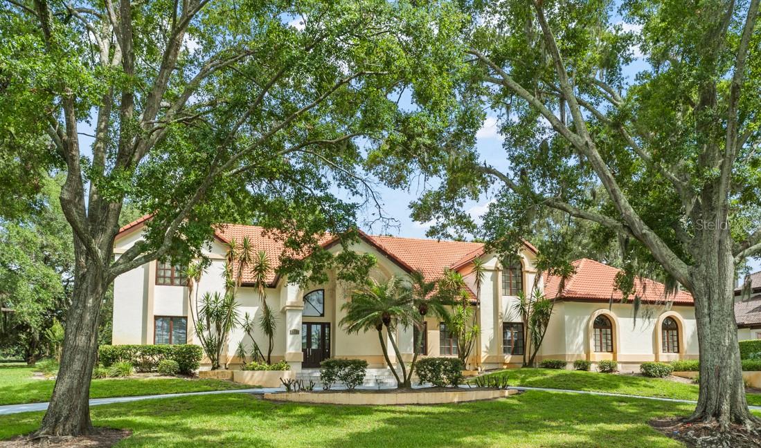 Set on an elevated corner homesite within Isleworth, this four-bedroom residence presents a unique opportunity to secure a coveted address in one of Central Florida's most distinguished private golf communities. Encompassing more than 4,700 square feet, the property offers exceptional potential for renovation, customization, or the creation of a new vision tailored to today's luxury lifestyle.Positioned overlooking the 6th tee of Isleworth's renowned championship golf course and across from a scenic pond with water features, the homesite enjoys a picturesque setting with golf and water views and mature landscaping. Existing amenities include a pool, summer kitchen, circular driveway, and a three-car garage.For buyers seeking an opportunity to personalize a home within Isleworth or establish a long-term presence in this exceptional community, few properties offer such a compelling combination of location, scale, and potential. Surrounded by the Butler Chain of Lakes and secured by four staffed guard gates, Isleworth is renowned for its championship golf, exceptional amenities, and unparalleled lifestyle, with club membership available separately.