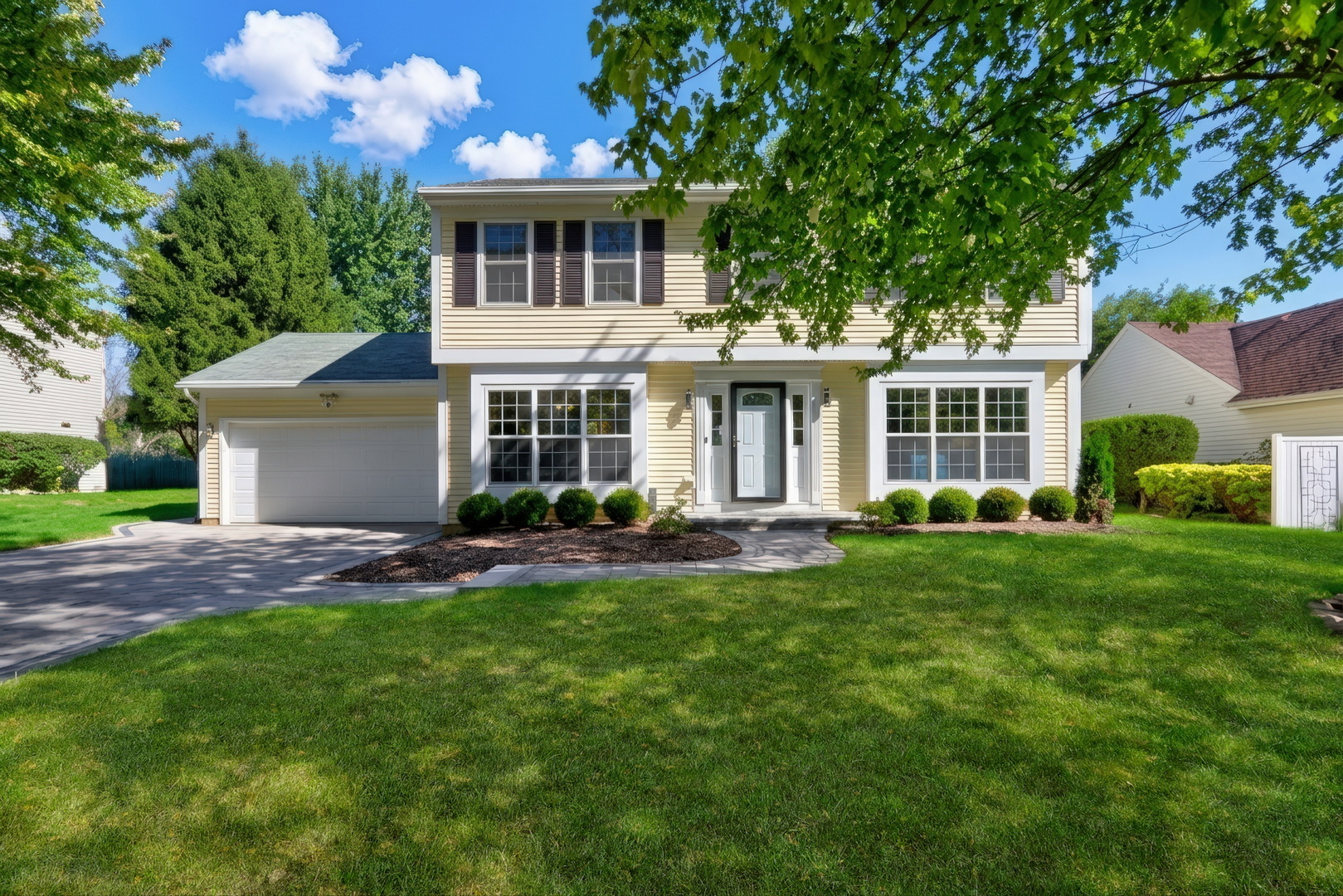 Welcome Home to this stunning home in the sought-after Southridge community. From the moment you arrive, the attractive curb appeal makes a great first impression. Step inside to a well-designed floor plan offering comfortable living spaces and an easy flow for both everyday living and entertaining. The formal living room and adjacent dining room provide an ideal setting for hosting family and friends. Whether you're gathering for a holiday celebration or enjoying dinner with guests, these rooms offer plenty of space to accommodate a crowd. The heart of the home is the updated kitchen, featuring white shaker cabinetry, quartz countertops, a stylish backsplash, stainless steel appliances, and a convenient breakfast bar. The thoughtful design provides ample workspace while maintaining an open connection to the surrounding living areas. Just off the kitchen, the eating area overlooks the backyard and provides a great spot for everyday meals, morning coffee, or casual gatherings. The family room is a comfortable place for everyone to gather and features a cozy fireplace that adds warmth and character to the space. With its connection to the kitchen and eating area, this portion of the home is ideal for both family time and entertaining. Head upstairs to discover a well-appointed bedroom level offering plenty of space for everyone. The primary bedroom features a comfortable en suite, including an updated bathroom with a standalone shower, beautiful tile work, and a sleek glass enclosure. Three additional spacious bedrooms provide flexibility for family, guests, or a home office, along with a full hall bathroom and a convenient laundry room. The finished basement adds another level of living space and versatility. A large recreation area provides room for movie nights, game days, entertaining, or relaxing with family. An additional exercise room makes it easy to create a dedicated fitness space at home. The basement also features a wet bar with a beverage refrigerator, making it an excellent extension of the home for entertaining and gatherings. Step outside and enjoy the backyard, which offers space for outdoor entertaining, play, gardening, or simply relaxing. The backyard views from the eating area create a nice connection between the indoor and outdoor spaces. Located in the desirable Southridge community, this home combines a functional floor plan with stylish updates and multiple areas designed for gathering and everyday living. With its updated kitchen, comfortable family room, private primary suite, three additional bedrooms, finished basement, recreation area, exercise room, and wet bar, there is plenty of room to accommodate the way you live. Come see all that this Southridge home has to offer!