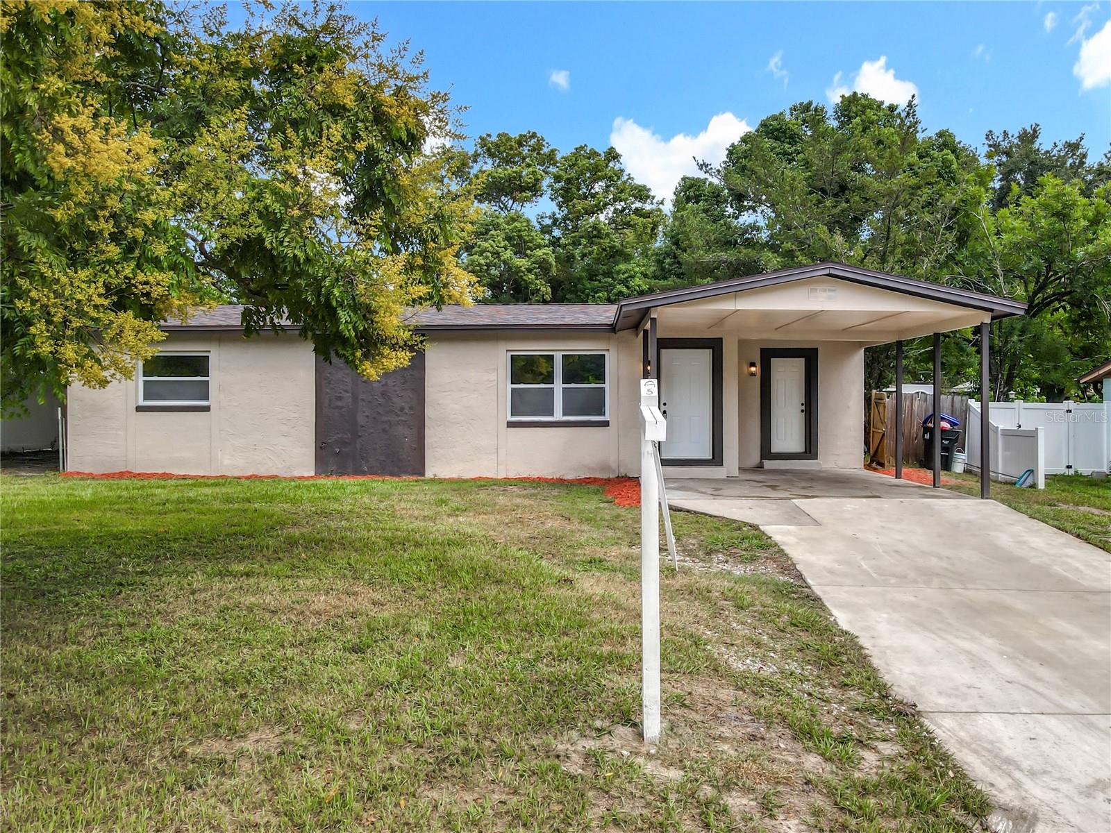 This stunning 4-bedroom, 2-bathroom home has been completely reimagined from the ground up, offering flawless design, and premium finishes. Situated on a generous lot in a sought-after Orlando neighborhood, this home combines comfort, function, and style in every detail. Step inside to an inviting open-concept layout with luxury vinyl plank flooring, stylish new tile flooring, new lighting, and abundant natural light streaming through new vinyl windows. The designer kitchen steals the spotlight with new cabinetry, new countertops, and new appliances—crafted for the modern entertainer. The primary suite offers a tranquil retreat with a spa-inspired en suite bathroom featuring beautiful tilework and elegant fixtures. Both bathrooms have been tastefully renovated to reflect timeless design. Enjoy the added flexibility of a dedicated laundry area and an extended driveway with covered front porch. Outside, the expansive backyard with an in ground pool is your canvas for creating the outdoor lifestyle you've always wanted—whether it's hosting gatherings, gardening, or relaxing in the Florida sunshine. Located just minutes from top-rated schools, parks, shopping, and dining, 3033 Sutton isn’t just move-in ready—it’s transformation perfected. Schedule your private showing today and fall in love with everything this exceptional home has to show.