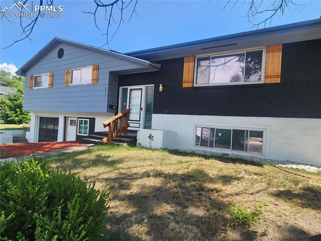 Beautifully updated 4 bed, 3 bath home on a spacious 0.22-acre lot! Featuring a brand-new kitchen, updated bathrooms, and all new flooring throughout. Enjoy year-round comfort with A/C, two cozy fireplaces, and a covered rear deck perfect for entertaining. The lower level includes a second kitchen and a versatile bonus space off the garage—ideal for multi-generational living or possible income potential. Fully fenced backyard offers privacy and room to play. A must-see with endless possibilities!