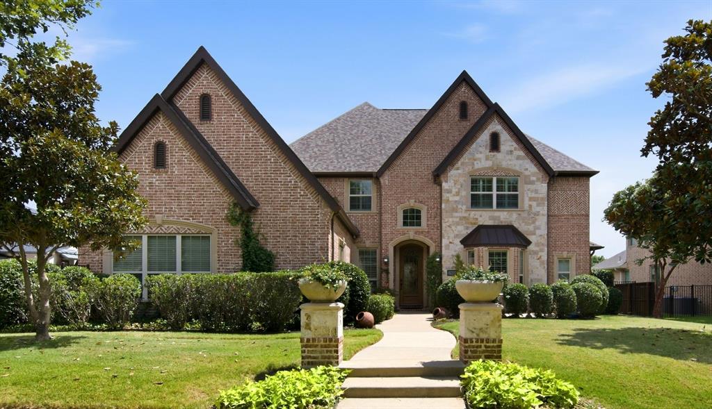 Nestled within the heart of Colleyville, this exquisite home offers a beautifully designed interior and open concept floor plan. As you enter through the custom iron door, its grand entrance will greet you with soaring ceilings, iron stair case, wine room, solid wood doors, plantation shutters, beautiful wood floors & magnificent windows, overlooking the stunning landscape & serene pool. At the heart of the home is a chef’s kitchen, designed for everyday living & entertaining with expansive island, 6-burner gas cooktop, double ovens, and walk-in pantry. Adjacent to the kitchen is the breakfast nook and main living area accented with hardwood floors, gas fireplace & custom cabinetry. First floor office with French doors, and Formal dining room with beautiful light fixture and hardwood floors are bathed in natural light, showcasing high-quality finishes and sophisticated design. Relax in your private owners suite with tray ceiling, sitting area and spa inspired primary bath with large double shower, jetted tub, and 2 walk-in closets. Upstairs, entertainment abounds with a spacious game-media room and 3 oversized bedrooms, with 2 full baths. Finally, Step outside to your private backyard oasis featuring a sparkling saltwater pool and spa with Paramount cleaning system. Spacious covered patio with built in grill, storage, outdoor sink, and griddle. The perfect setting for relaxation and outdoor entertaining. Additional features include Jelly Fish LED lighting system, complete home filtration and reverse osmosis water system, and garage wired with 2 (240V) outlets for your electric vehicle charging station. The home was built with natural RockWool Insulation for noise reduction and temperature regulation. Welcome Home!