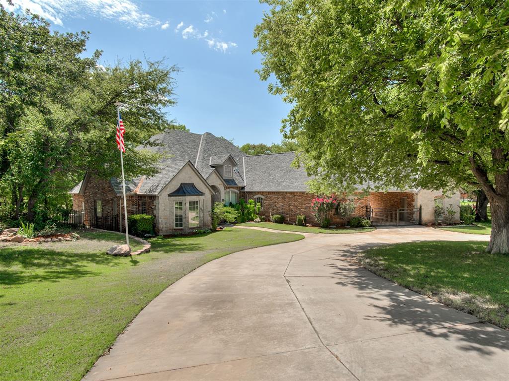 Beautiful, peaceful surroundings of rural life in this Cardinal Ridge community on acreages with all of the wildlife right in your back yard.  The main living room space comes with a fireplace, vaulted ceiling and plenty of windows looking out to your very secluded back yard.  The beautiful kitchen is both functional and inviting and comes with a breakfast bar, large pantry, under counter lighting and a gas cook top and plenty of windows for the back yard view.  It comes with a formal dining room and a study with double glass doors and plenty of built-ins.  The spacious primary suite with a sitting area offers a peaceful retreat with garden doors to open to the scenic view of the back yard. The primary bath offers a very spacious walk in closet with built-ins and an oversized tub.   Upstairs is the perfect 4th bedroom with a full bath and could also be used as the media room.  This house also boasts 4 car garages with the 3rd car garage equipped with heat and air perfect for a man cave.  All 3 HVAC units were replaced in 2025 and the Class 4 High Impact roof was installed in 2025.  There is also an outside shower right off of the primary suite.