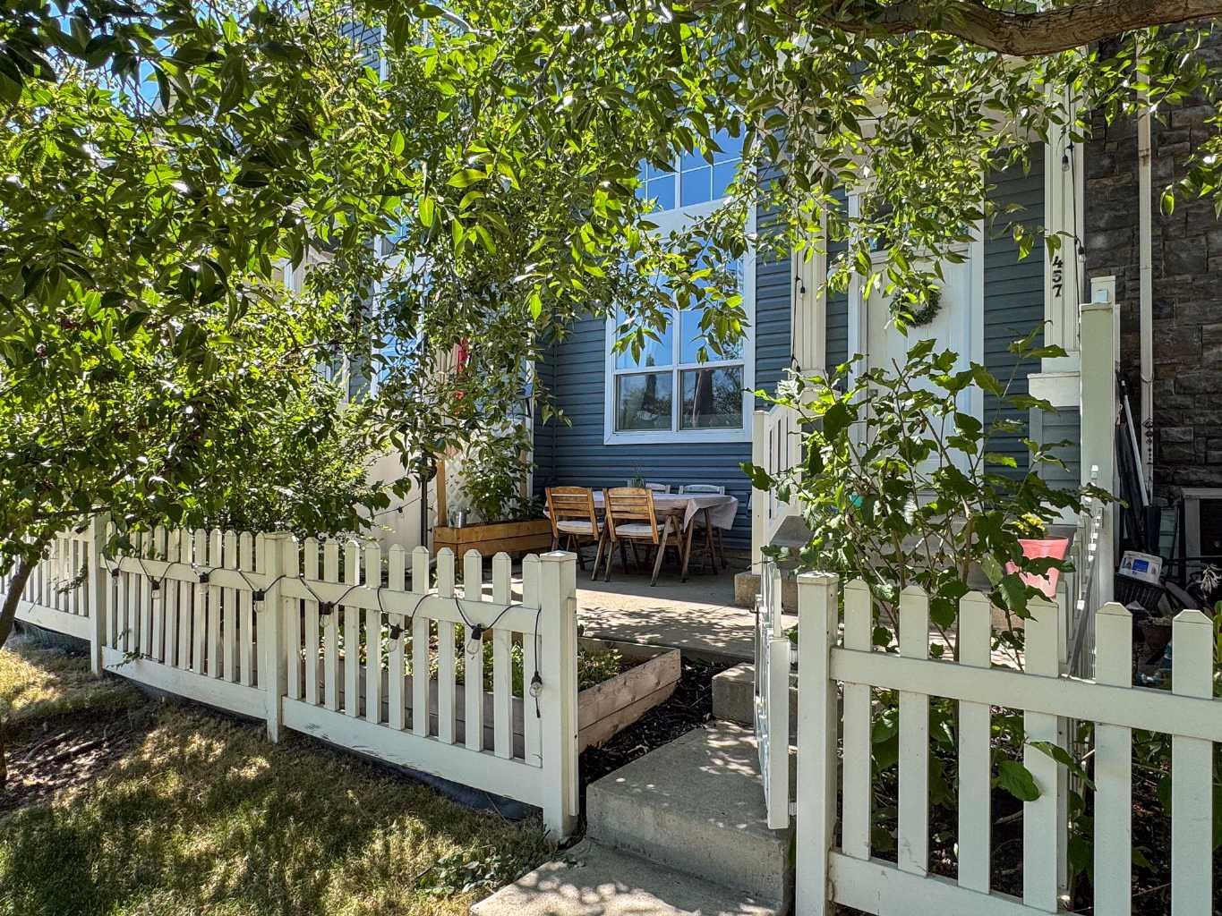 *** OPEN HOUSE  Saturday Aug 15th from 1-3pm  and Sunday Aug 16th from 11am-1:pm*** Welcome to your dream townhome in the heart of McKenzie Towne, where convenience meets quiet, community oriented living. Your private patio is a summer oasis.  Shaded all afternoon by incredible trees, it looks onto a gorgeous park that amps up both the natural beauty and your personal privacy.  Open your front gate and you’re on a path that makes your new home easy to find for guests, and also connects you to beautiful walking paths to scenic ponds, parks and playgrounds.  Go inside and you (and your guests) will be instantly captivated by the open floor plan. Unlike other units separated by solid walls, this unique layout features a soaring ceiling and elegant railing overlooking the living area, making it perfect for entertaining. In fact, this incredibly spacious home has comfortably hosted up to 20 people! The bright kitchen flows into a cute breakfast nook, the perfect spot for your morning coffee. Upstairs, you will find a rare double master layout. Both large bedrooms feature their own private ensuite bathrooms, giving your guests or roommates a full, dedicated space to relax when staying over. Parking and storage are a breeze with the full-sized garage, offering space to park 2 vehicles or 1 and have room for a dedicated workshop or hobby area. Tucked away in a peaceful complex, this home offers true ease of living, absolute quietness, and a tight-knit atmosphere with wonderful neighbours you will genuinely love. Don't miss this rare opportunity to own a private, highly walkable retreat that perfectly blends seamless hosting capabilities with exceptional community comfort. Rarely do homes in this complex (or any other for that matter) that face onto a park come available. Make this one yours before someone else does!