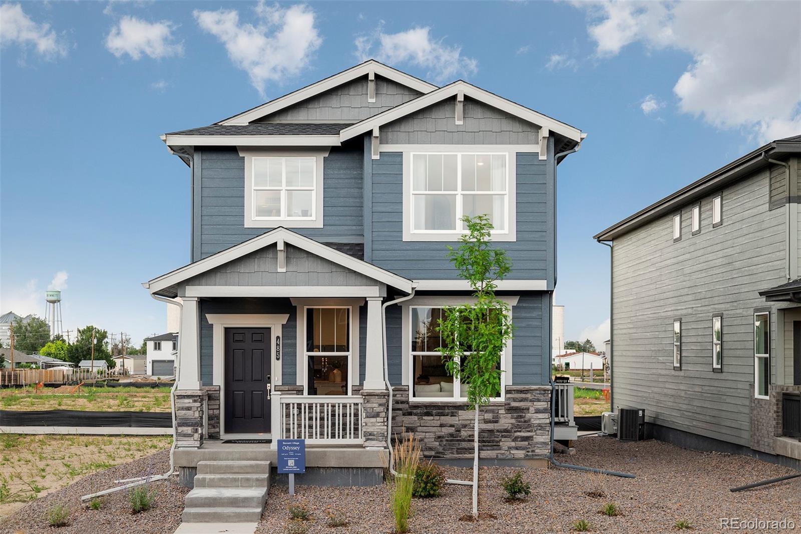 Located in the brand new Bennett Village community, this beautiful Odyssey 2-story model home  features 3 baths, 2.5 baths, great room, kitchen, upper laundry and 2 car garage. Beautiful upgrades and finishes throughout including luxury vinyl plank flooring, stainless steel appliances and more. Come see what you have been missing today! Welcome home! Note new construction - this is the former model and sold as-is.  Staging items available for separate purchase.  This home comes equipped with central air conditioning. Special financing not available on this home - it is a resale.  There will not be a property disclosure.