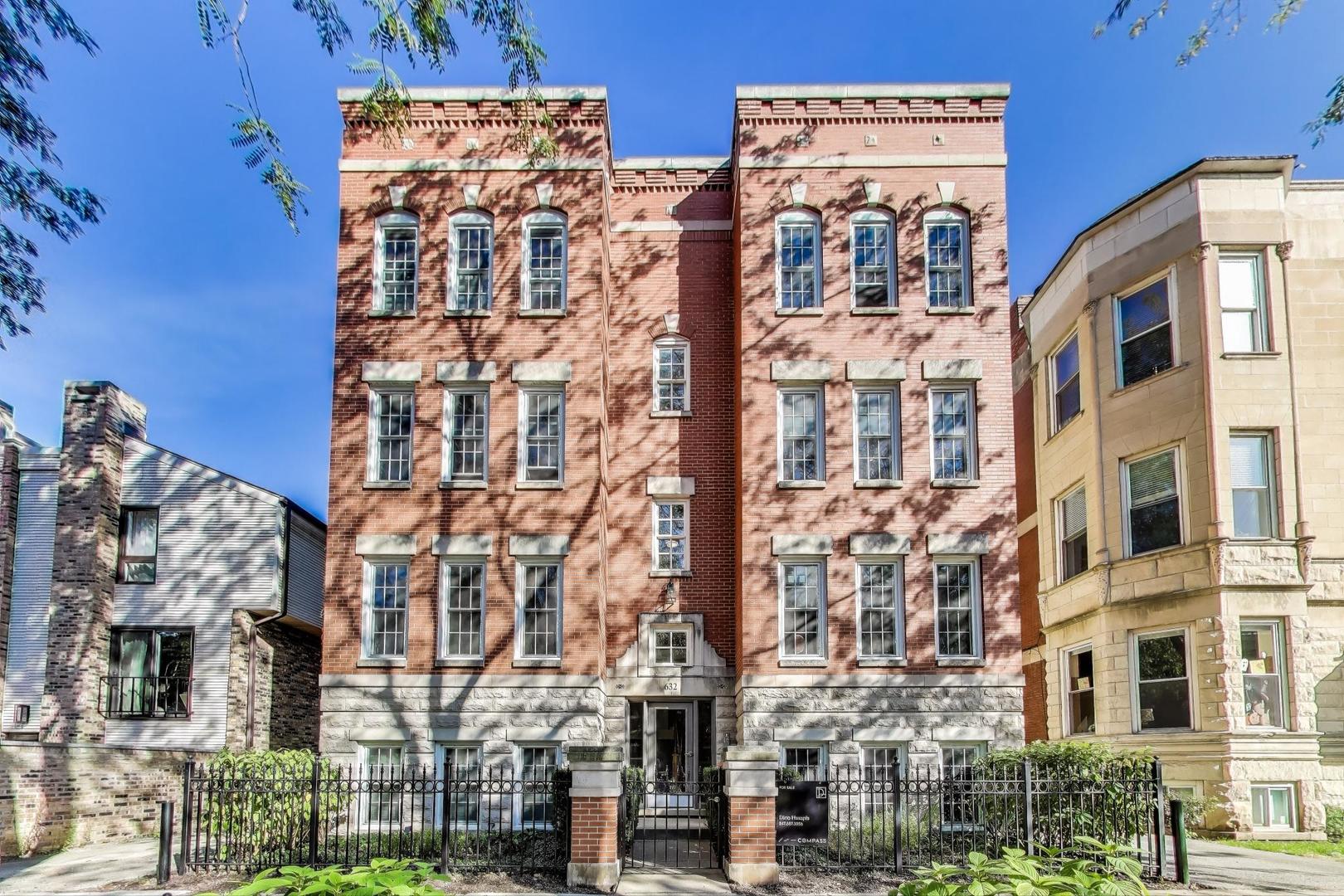 Sunlit and just steps from the lake-welcome to the epitome of East Lakeview living! This stylish 2-bedroom, 2-bathroom condo is nestled on a quiet, tree-lined street within one of the neighborhood's most sought-after boutique buildings. The meticulously maintained, pet-friendly building provides a rare private garage, enhancing the convenience and security of urban living. Residents enjoy a warm sense of community that distinguishes it from typical high-rise living. Furthermore, the common rooftop deck offers breathtaking city views, creating an idyllic space for relaxation and social gatherings. Step inside to discover a spacious living room seamlessly combined with a generously sized dining area-an often-missing feature in newer constructions. The living room is adorned with hardwood floors and a cozy gas remote fireplace, while a large bay window bathes the space in natural light, setting this unit apart from others.    The classic white kitchen is both functional and stylish, showcasing hardwood floors, stainless steel appliances, granite countertops, and a convenient pass-through to the dining area. The ample master bedroom suite offers a private balcony deck, a remodeled bathroom with quartz countertops, a stone shower featuring a rainforest shower head, and body sprays for a spa-like experience. The good-sized second bedroom, accessible through French doors, provides plenty of storage and built-in shelves, making it a perfect office or second bedroom. The second bath is classically finished in harmony with the master bath, ensuring a cohesive and elegant design throughout. Additional conveniences include in-unit laundry with a new full-sized front-loading high-efficiency washer and dryer, offering modern comforts to complement this beautifully appointed home. This residence perfectly blends classic charm with contemporary amenities, providing an exceptional living experience in the heart of East Lakeview.