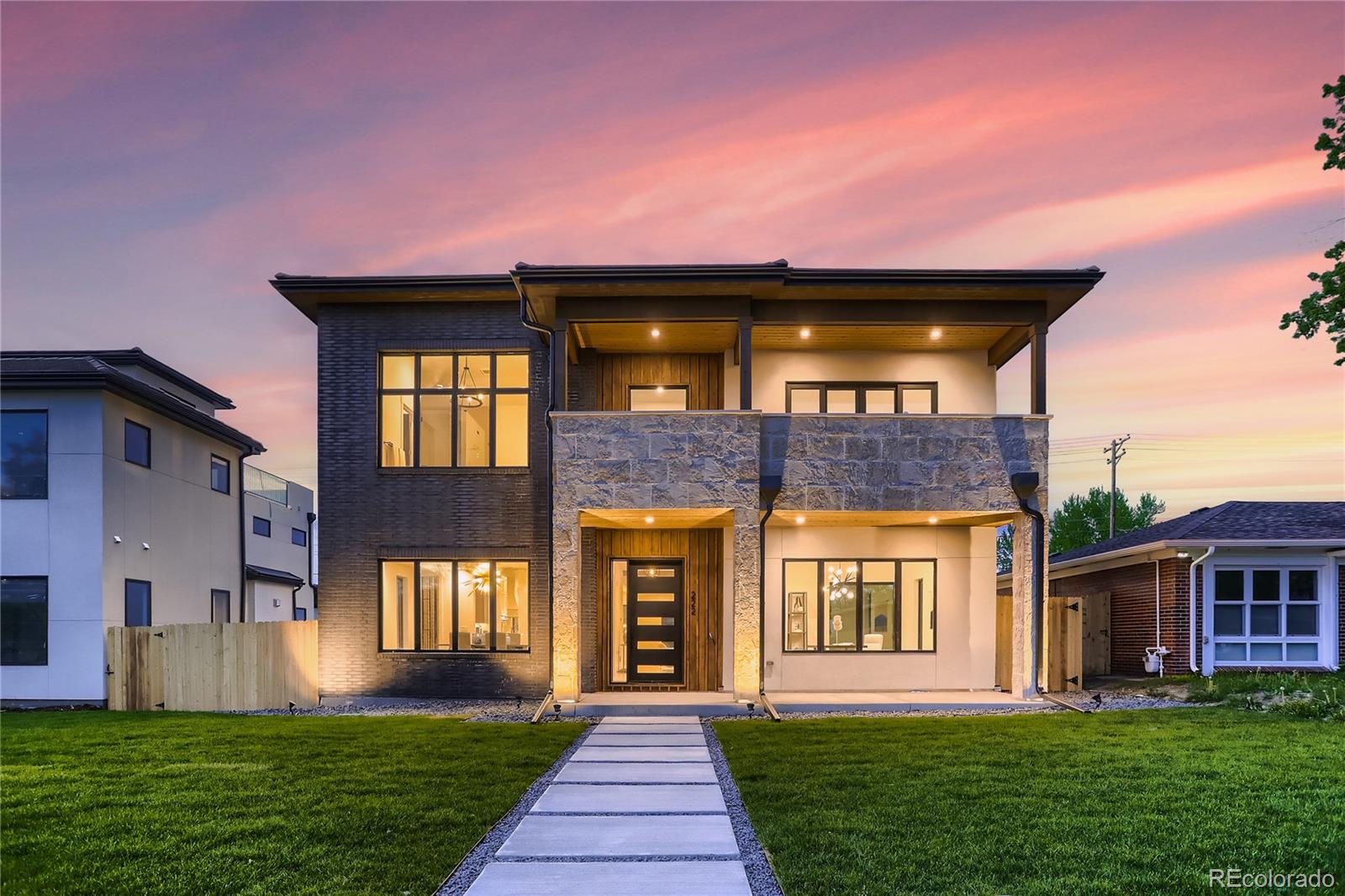 Welcome to this exceptional, new home finished in August, 2023 nestled in the prestigious Hilltop neighborhood. Boasting elegance and sophistication, this masterpiece offers the finest in modern luxury living. With 5 bedrooms, 5.5 bathrooms, a rooftop deck, two wet bars, gym, and an attached 3-car garage, this residence is designed to exceed your expectations. As you step inside, you'll immediately notice the meticulous craftsmanship and attention to detail. The open floor plan seamlessly connects the main living spaces, allowing for effortless entertaining and comfortable everyday living. The vaulted ceilings, large windows, and abundant natural light create an airy and inviting ambiance throughout the home. The gourmet kitchen is a chef's dream, featuring top-of-the-line appliances, custom cabinetry, and a spacious center island. The butler's pantry connects to a stylish dining area, perfect for hosting intimate gatherings or large dinner parties. Escape to the luxurious primary suite, which offers a private sanctuary for relaxation including a private balcony. Pamper yourself in the exquisite 5-piece bathroom, complete with a deep soaking tub, oversized shower, and dual vanities. The remaining four bedrooms are equally well-appointed, providing ample space for family or guests. A standout feature of this home is the rooftop deck, where you can enjoy panoramic views of the surrounding neighborhood and beyond. Whether you're hosting a summer bbq or simply unwinding after a long day, this outdoor oasis is perfect. The attached 3-car garage is equipped with 12-foot ceilings, offering the ideal space for a vehicle lift. The prime location has easy access to top schools, shopping, and fine dining. Experience the epitome of luxury living in this exquisite new construction home. Don't miss out on the opportunity to make this dream home yours. Schedule a private viewing and immerse yourself in the unparalleled luxury and sophistication this residence has to offer.