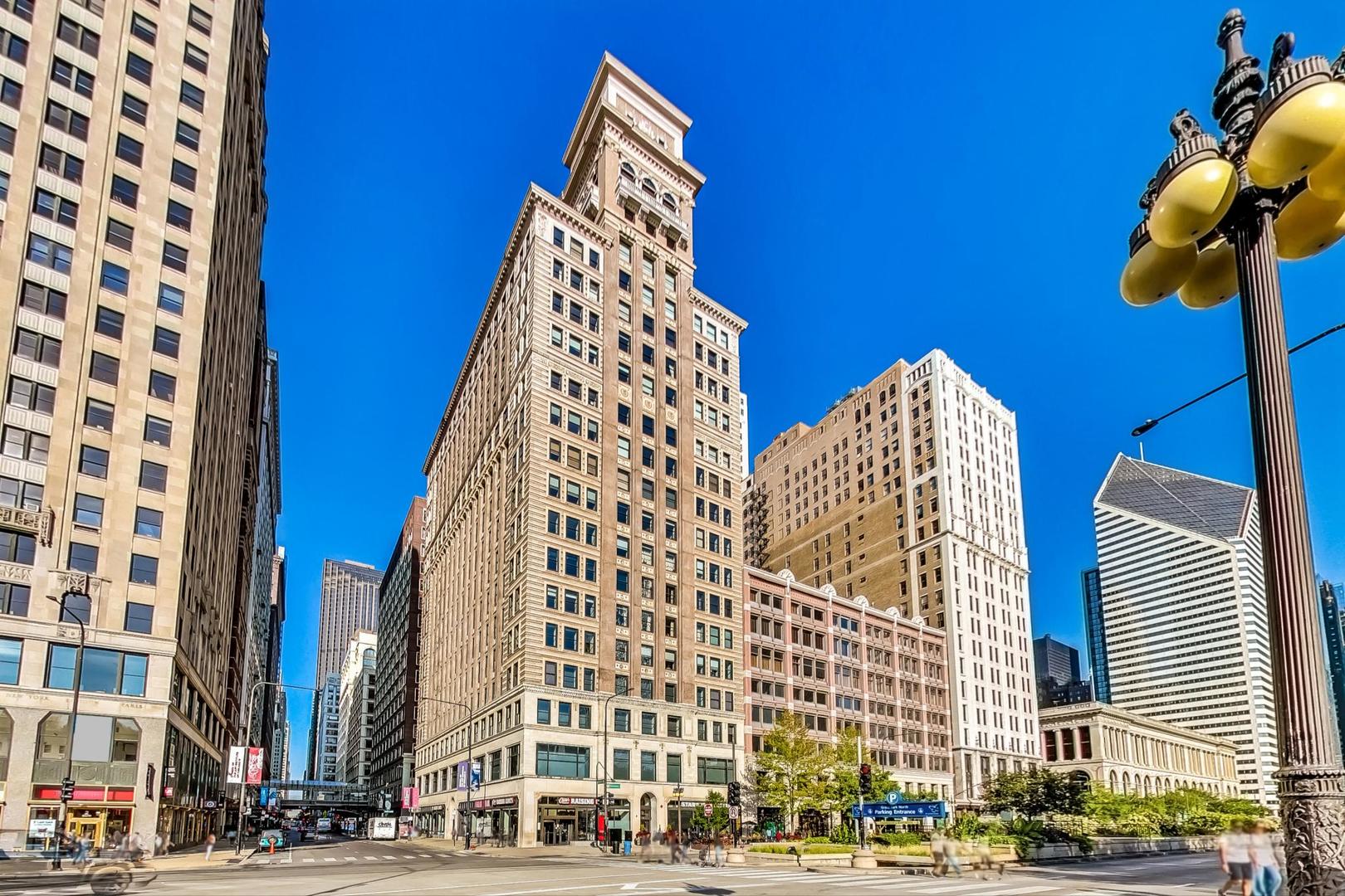 Just listed! Unique luxury two bedroom, two bath loft style home with 10' ceilings and panoramic views of the skyline, lakefront and Millennium Park.    Chef's kitchen features Stainless Steel Italian appliances, oversize quartz countertops and Scavolini cabinetry. Open floorplan living/dining room is bright, spacious and enjoys beautiful views. Hardwood floors throughout the unit. Primary bedroom features an ensuite bathroom with porcelain tile, double vanity and quartz counters plus a relaxing whirlpool tub. The second bedroom is well sized and can be used as an office or den. Second bathroom with quartz counters/porcelain tile shower/tub is adjacent to the in-unit laundry. Two generously sized walk-in closets within the unit. Additional storage locker on the 3rd floor parking level.    Grand, luxury amenity building features an expansive rooftop terrace with awesome views of both Lake Michigan and the Chicago skyline. A 24-hour doorperson provides ultimate security. On the 5th floor, an exceptional fitness/health facility equipped with a wide range of exercise machines and separate steam and sauna rooms.     An expansive 6th floor residents' lounge includes a fine entertainment area and a separate theatre/media room.    Magnificent Mile, Chicago Riverwalk, loop business districts, lakefront trails, harbors, yacht clubs, museums and Maggie Daley Park just steps away.    Superior corner deeded garage parking space P320 is available for purchase.