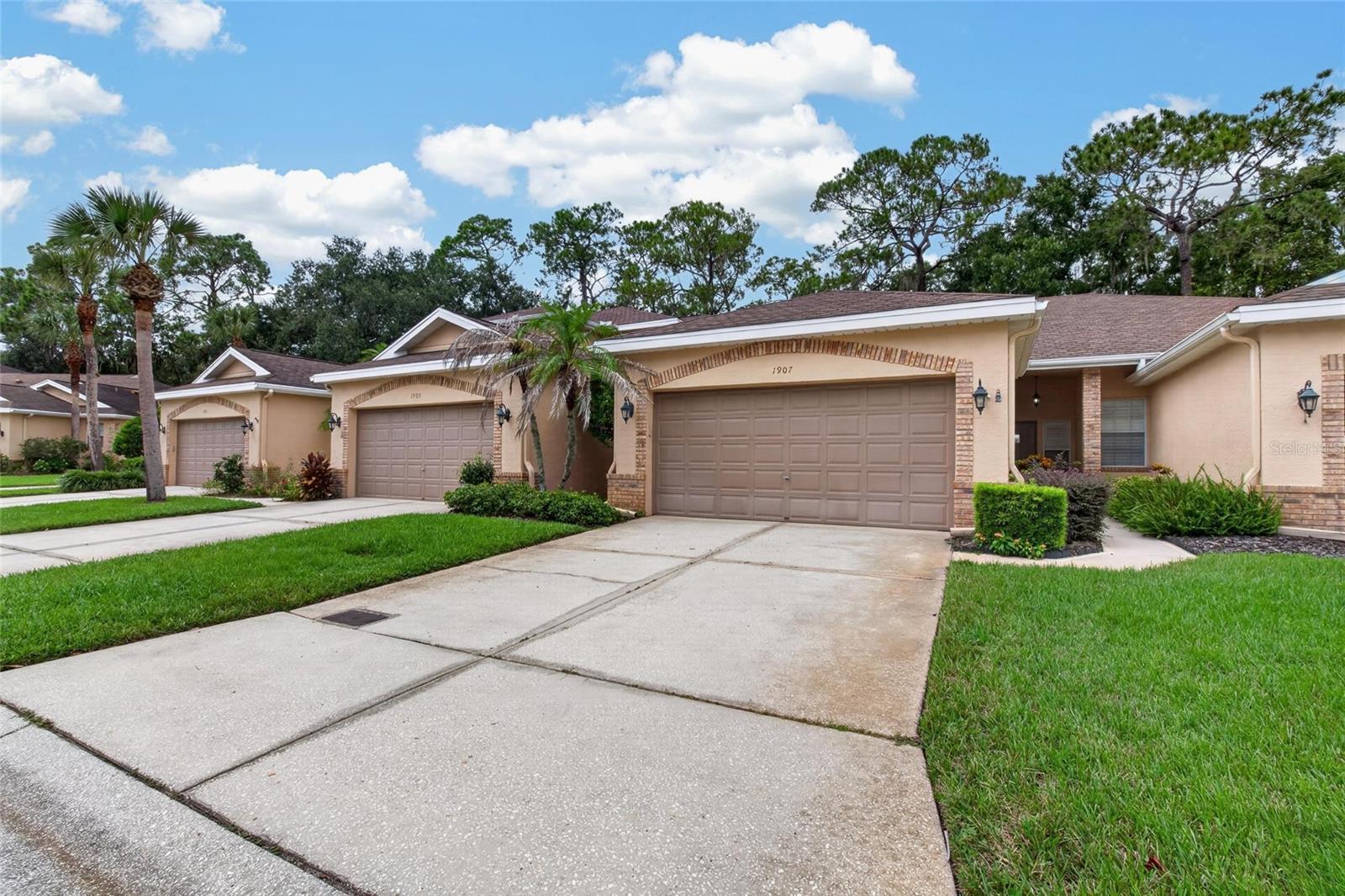 Enjoy a more refined approach to Florida living at 1907 Preservation Drive, tucked within the gated Preserve at Walden Lake. This inviting 2-bedroom, 2-bath condo offers a spacious, comfortable interior with a private 2-car garage and laminate flooring flowing through the living and dining areas. The kitchen combines timeless traditional styling with granite countertops and a generous layout that is both practical and welcoming. At the heart of the home, the enclosed solarium provides a peaceful retreat with a beautiful private conservation view—an ideal setting for morning coffee, reading, or simply enjoying the surrounding natural beauty. The thoughtfully designed floor plan offers comfortable spaces for everyday living while providing flexibility for guests, a home office, or hobbies. Life at The Preserve is designed to be easy, with the condo association handling numerous exterior and community services, including basic cable, annual gutter cleaning, driveway pressure washing, and palm tree trimming. Guarded gate access at night through the master association adds an additional layer of convenience and peace of mind. As part of Walden Lake, residents enjoy miles of scenic walking and biking trails, parks, lakes, playgrounds, sports courts, and gathering spaces surrounded by mature trees and natural beauty. Conveniently located in Plant City with easy access to Tampa and Lakeland, this is an opportunity to enjoy a well-established community, a low-maintenance lifestyle, and a home with a beautiful conservation view.
