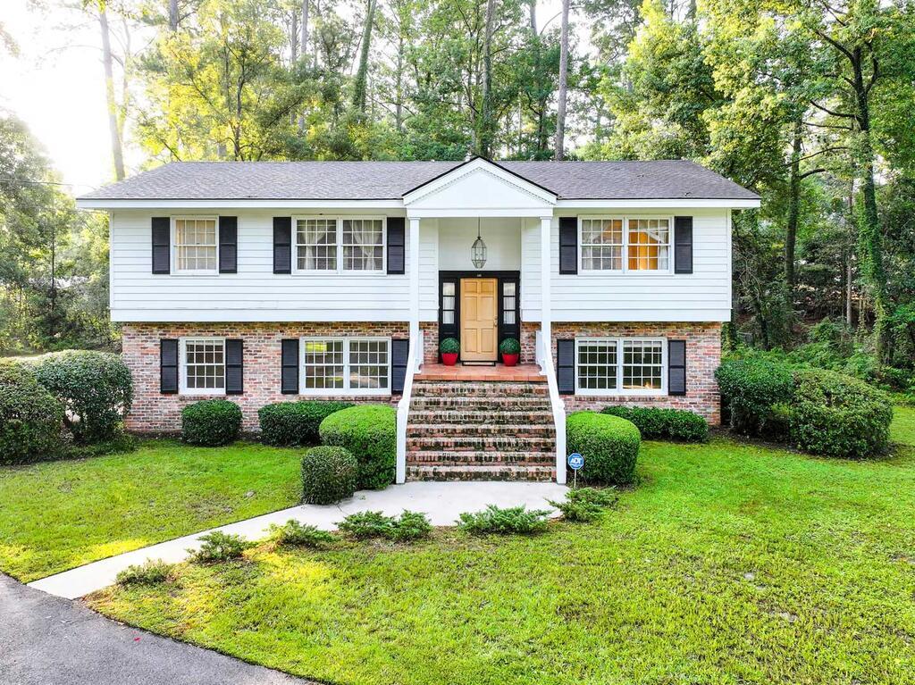 Located on a corner lot in the sought-after Jerger school district and just a golf cart ride to downtown, this neighborhood is a shining example of the lifestyle that Thomasville is known for. This 4-bed, 3-bath home offers 2,608 square feet of space, versatility, and comfort without sacrificing convenience. The combined living and dining room makes a wonderful place to spend time with your friends and family. The kitchen features plenty of counter space, lots of cabinets, and beautiful stainless steel appliances. Three bedrooms are located on the main floor, including the spacious primary bedroom. Downstairs, an additional massive bedroom is located along with a beautiful bonus room that could serve as anything from another bedroom to a home gym to an entertainment room. Sunny afternoons and cool evening nights are the perfect time to relax out on the beautiful back deck. Updates to the home provide security and peace of mind with a new HVAC, newer roof (2021), newer driveway, and remodeled downstairs bathroom and bedroom.