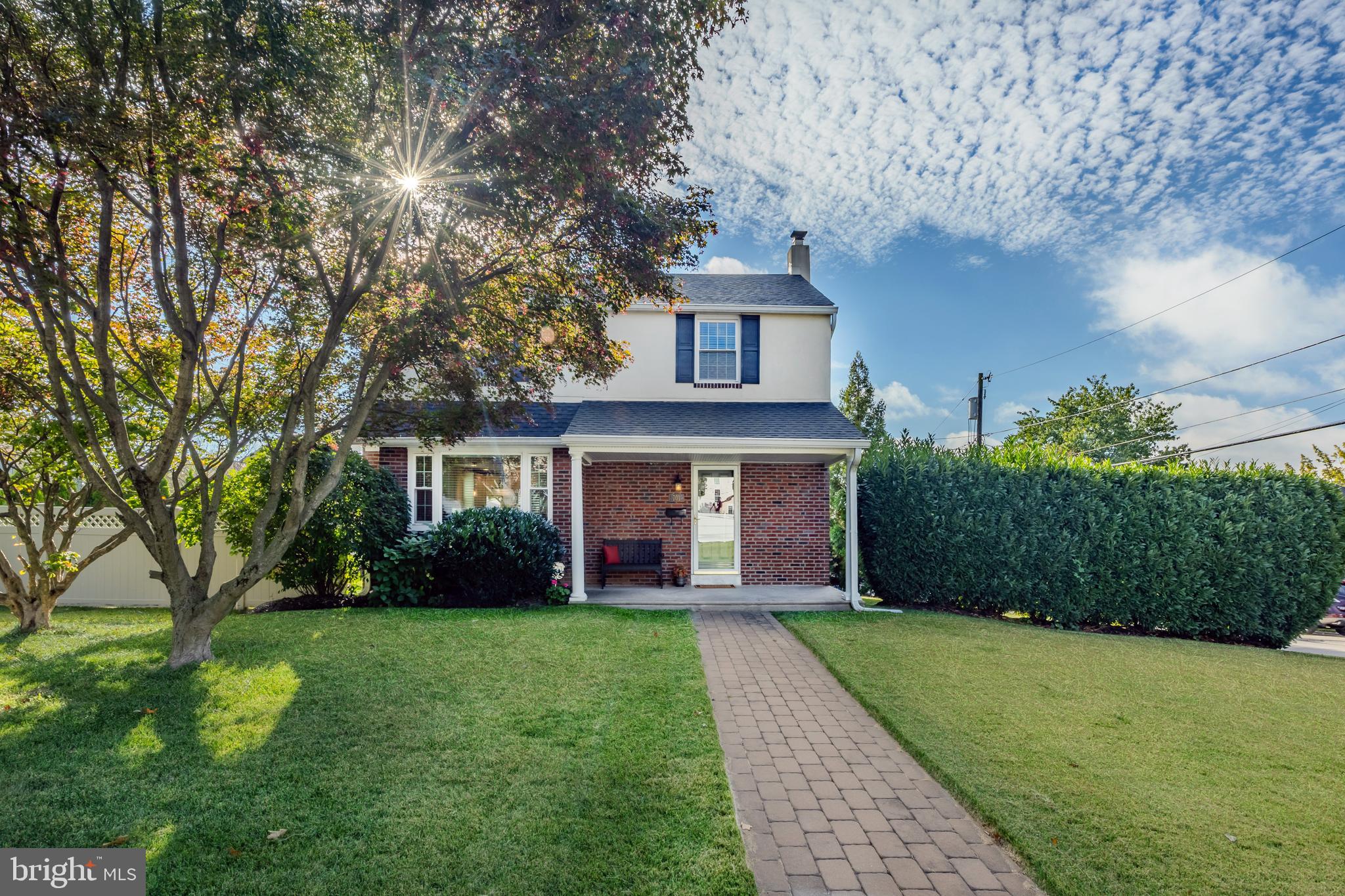 Pride of homeownership shines in this amazing 3 bedroom, 2 full bath single brick Colonial home right in the heart of Ardmore!  The walkability factor is off the charts and so are the upgrades the current owners have poured into this home.  Situated on a spacious lot, you can enjoy a large backyard with beautiful privacy screening,  a new patio, a covered back porch, a private drive and detached garage.  The location can’t be beat with its walkability to all things Ardmore and Havertown, schools, parks and public transportation.  This pristine home has a great floor plan that's been perfectly maximized.  Enter at the covered front porch and head on in!  The first floor has a great flow to include a sunlit living room with the original oak hardwood floors in beautiful condition that flow into the open concept kitchen and dining room.  The kitchen has been renovated and opened up to include a large peninsula with seating, granite countertops, stone tiled backsplash, recessed and pendant lighting, stainless steel appliances and in the dining space, room for a larger table, serving piece, coat closet and a bay window.  Upstairs on the second floor you’ll find a beautifully renovated hall bath with a Carrera top vanity and upgraded tilework.  Each bedroom is naturally sunfilled and has ample closet space.  The lower level of the home offers great versatility with its layout.  There is a rec room space, office nook, a full bath and a laundry area.  Because of the full bath, this is a great space for out of town guests if needed.   This home has newer vinyl windows throughout, including brand new windows in the lower level, the exterior patio was done this year, both bathrooms and the kitchen have been renovated.  There are countless other upgrades that have been made such as the roof in 2021, wiring for surround sound in the kitchen and back porch (great for parties), hardscaping outside, the HVAC and so much more!  Enjoy your short walks to grab a cup of coffee at The Head Nut, lunch at Carlino’s and dinner at Sam's Brick Oven Pizza.  You will not be disappointed in this home or its location and you’ll fall in love with this home the moment you walk in the door.