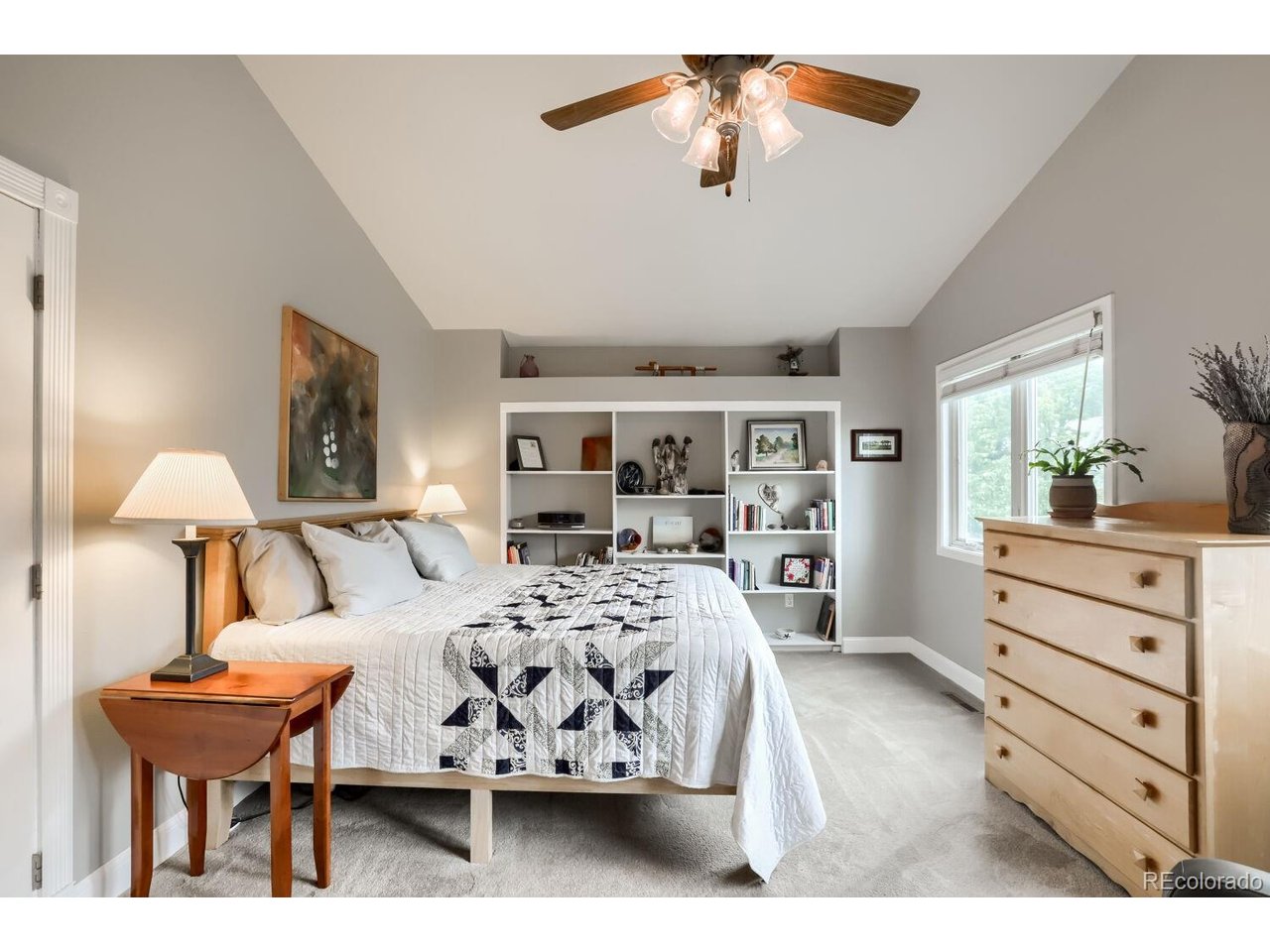 Welcome to this stunning 4-bedroom, 4-bath home in the highly desirable Collindale neighborhood, offering convenient access to everything Fort Collins has to offer. Step inside to a grand vaulted formal living room featuring a charming bay window with built-in storage, creating a bright and welcoming first impression. The adjoining formal dining room is filled with natural light from multiple windows, making it ideal for entertaining. The beautifully updated kitchen showcases soft-close white cabinetry, stainless steel appliances, stone countertops, and ample workspace. Open to the kitchen, the inviting family room is the heart of the home, complete with bar seating, a cozy fireplace, and a sliding glass door leading to the backyard-perfect for seamless indoor-outdoor living. Outside, you'll find a private, park-like backyard featuring an elegant Italian stone patio, plenty of room for entertaining or relaxing, garden beds, and raised vegetable gardens. Upstairs, the spacious primary suite is filled with natural light and offers built-in shelving along with room for a comfortable sitting area. The luxurious en-suite bath has been tastefully updated with newer cabinetry and natural stone countertops and flooring. Two additional generously sized bedrooms and a beautifully updated full bathroom complete the upper level. The fully finished basement provides exceptional flexibility with a media room, an office or bonus room featuring built-in cabinetry and closet storage, an additional bedroom, and a full bathroom-ideal for guests, hobbies, or multigenerational living. Additional highlights include premium Renewal by Andersen windows throughout and a QuietCool whole-house fan for enhanced comfort and energy efficiency. This exceptional home combines timeless style, thoughtful updates, and an unbeatable location. Schedule your private showing today!