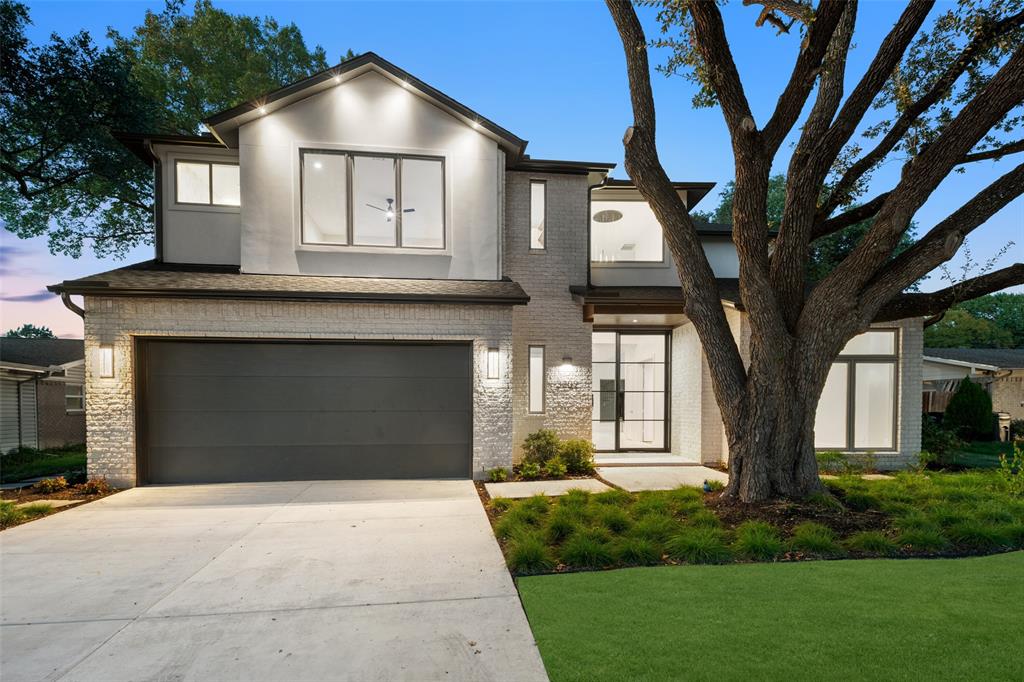 Welcome to your Dallas sanctuary—where architectural elegance meets modern performance. Outfitted with full spray-foam insulation, this home ensures optimal energy efficiency. Culinary enthusiasts will adore the chef’s kitchen, complete with Taj Mahal Quartzite, custom cabinetry, Fisher & Paykel appliances, and an expansive walk-in pantry & prep kitchen. Entertain effortlessly as the main living and dining areas flow directly out to a built-in BBQ cooking center. Leading to the Primary suite, enjoy a beautifully landscaped courtyard anchored by a stunning 50+ year-old tree. The primary suite is a luxurious retreat featuring a freestanding soaking tub and custom LED-lit closet. This home is complete with a dedicated quartzite bar, Smart Home pre-wiring for audio and security, an EV-ready garage, and manicured grounds, every detail has been thoughtfully curated.