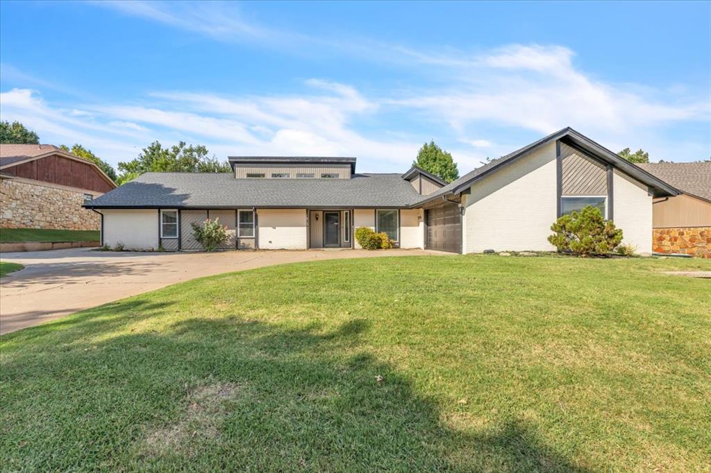This beautifully updated home brings together timeless curb appeal and modern comfort in one of Edmond’s most established neighborhoods. With nearly 2,400 square feet, four bedrooms, three full baths, and a dedicated study, it offers space that adapts easily to everyday living.

The heart of the home is the renovated kitchen, designed with soft sage cabinetry, quartz countertops, a subway tile backsplash, center island, and a built-in double oven. It opens into a light-filled living space where vaulted ceilings, clerestory windows, hardwood floors, and a painted brick fireplace with custom built-ins create a bright and welcoming atmosphere.

The primary suite provides a private retreat with its updated en suite bath, featuring dual vanities, quartz counters, modern lighting, and a walk-in tiled shower. Additional bedrooms and bathrooms have been refreshed with thoughtful finishes throughout.

Step outside to discover the backyard oasis. A sparkling inground pool with attached hot tub and waterfall feature is the centerpiece, framed by a covered patio with tongue-and-groove ceiling and string lighting that adds a warm glow to evenings. With grassy areas, mature trees, and added concrete for gathering, it’s a space designed to enjoy year-round.

Set on a quiet street with convenient access to schools, dining, and shopping, this home balances updates, character, and comfort in a way that feels truly special.
