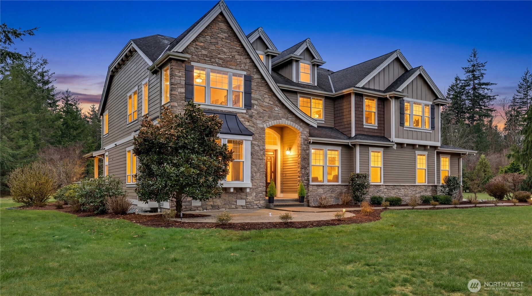 Welcome to The Reserve at Lake Sawyer! This beautifully maintained home offers space, comfort, and thoughtful design throughout. The bright, open great room flows seamlessly into the dining area, creating an inviting setting for everyday living and gatherings. The kitchen features an eating area and connects easily to the living room with a gas fireplace. A main-level office adds flexibility for work or hobbies. Large windows fill the home with natural light, while A/C ensures year-round comfort.    Upstairs, the primary suite offers a peaceful retreat, complete with a gas fireplace, two closets, and a well-appointed 5-piece bathroom. Three additional bedrooms provide flexibility for a variety of needs, and the spacious, light-filled bonus room offers the perfect setting for relaxing, entertaining, or everyday living.    Outside, enjoy a large backyard with a covered patio—ideal for outdoor dining or unwinding. The expansive 1,400 sq ft 4-car garage provides exceptional space for parking, storage, or projects. This home combines generous living areas with practical features, all in a desirable Black Diamond location.