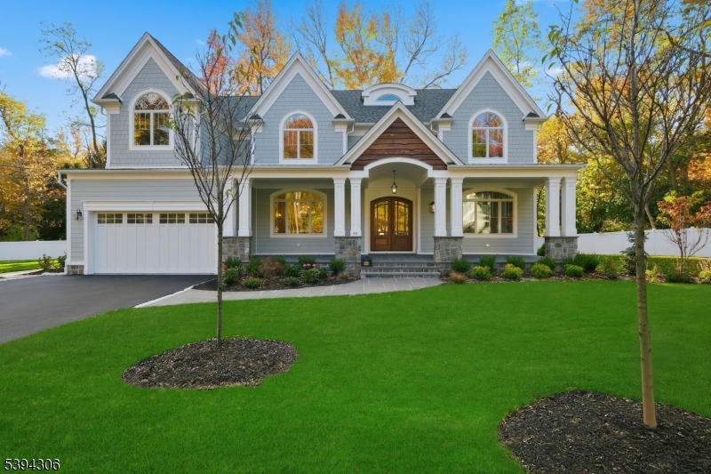 Located on a brand-new cul-de-sac,this 6600 +/- sq ft stunning new Buontempo construction blends luxury,craftsmanship,and modern design with 6 bed and 8 total baths.A dramatic two-story foyer with herringbone hardwood floors introduces soaring 10-foot ceilings and elegant architectural details throughout. The main level begins with a bright living room framed by French doors, offering the perfect space for working from home or quiet relaxation. A spacious family room with a gas fireplace and built-in surround sound provides a warm and inviting gathering place.At the heart of the home is the chef's kitchen, thoughtfully designed for both function and beauty. It features custom Medallion cabinetry with under-cabinet lighting, quartz countertops, Thermador appliances, and a large work island sink. A spacious first-floor ensuite bedroom, large pantry, and mudroom with built-ins add convenience. Upstairs, all ensuite bedrooms provide generous space and privacy. The luxurious primary suite features stunning cathedral ceilings and a grand walk-in closet and the spa-like primary bathroom includes a clawfoot soaking tub and a rain showerhead. The walkout basement features a full bathroom perfect for a media room or play area with plenty of storage. Exterior highlights include Bevolo gas lanterns, cultured stone accents, professional landscaping, and gas and water lines ready for an outdoor kitchen.A new trail to Tamaques Elementary School ensures a safe route for walking or biking.