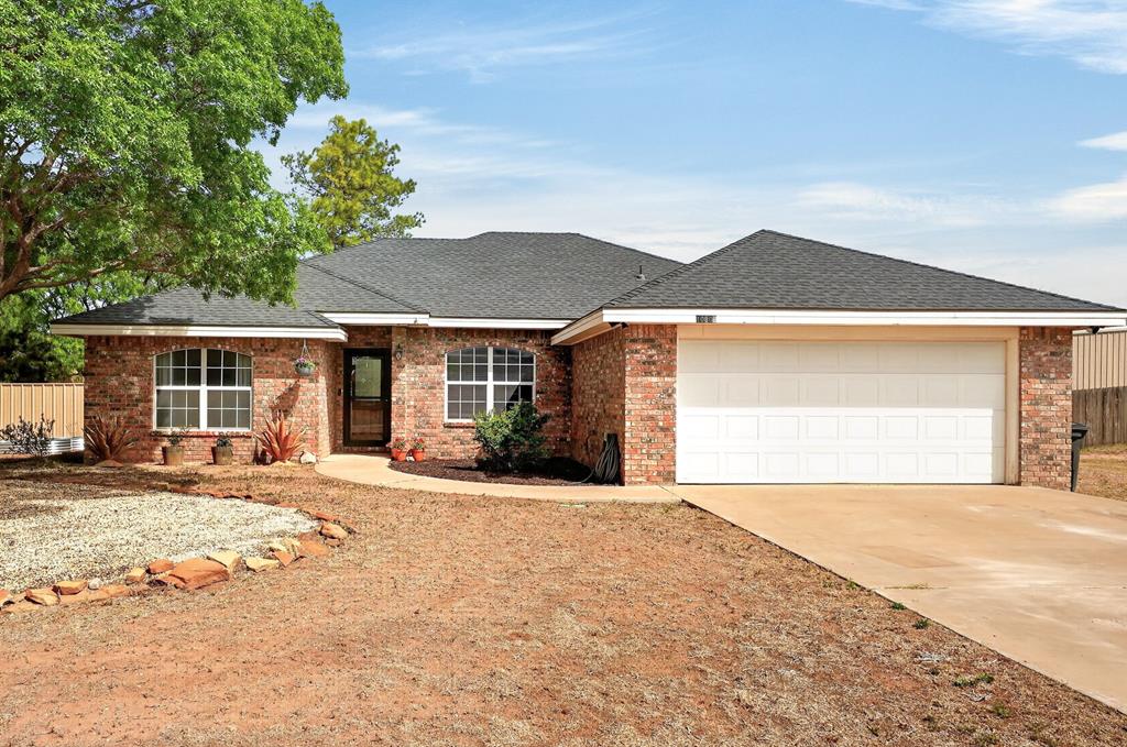 Nicely updated 3 bed/2 bath home in Greenwood ISD on almost 1/2 an acre. Light and bright with lots of windows. Nice size living plus formal dining makes a great home office or 2nd living. Laminate wood flooring and tile throughout. Updated kitchen boasts stainless appliances, floating shelves and concrete countertops. Interior freshly painted. Sequestered master. Spacious bedrooms with great closets. Utility room with gas or electric connection for dryer. This home is complete with a 30x40 insulated workshop, metal fence & chicken coop, plus large garden planters on the west side of the home.