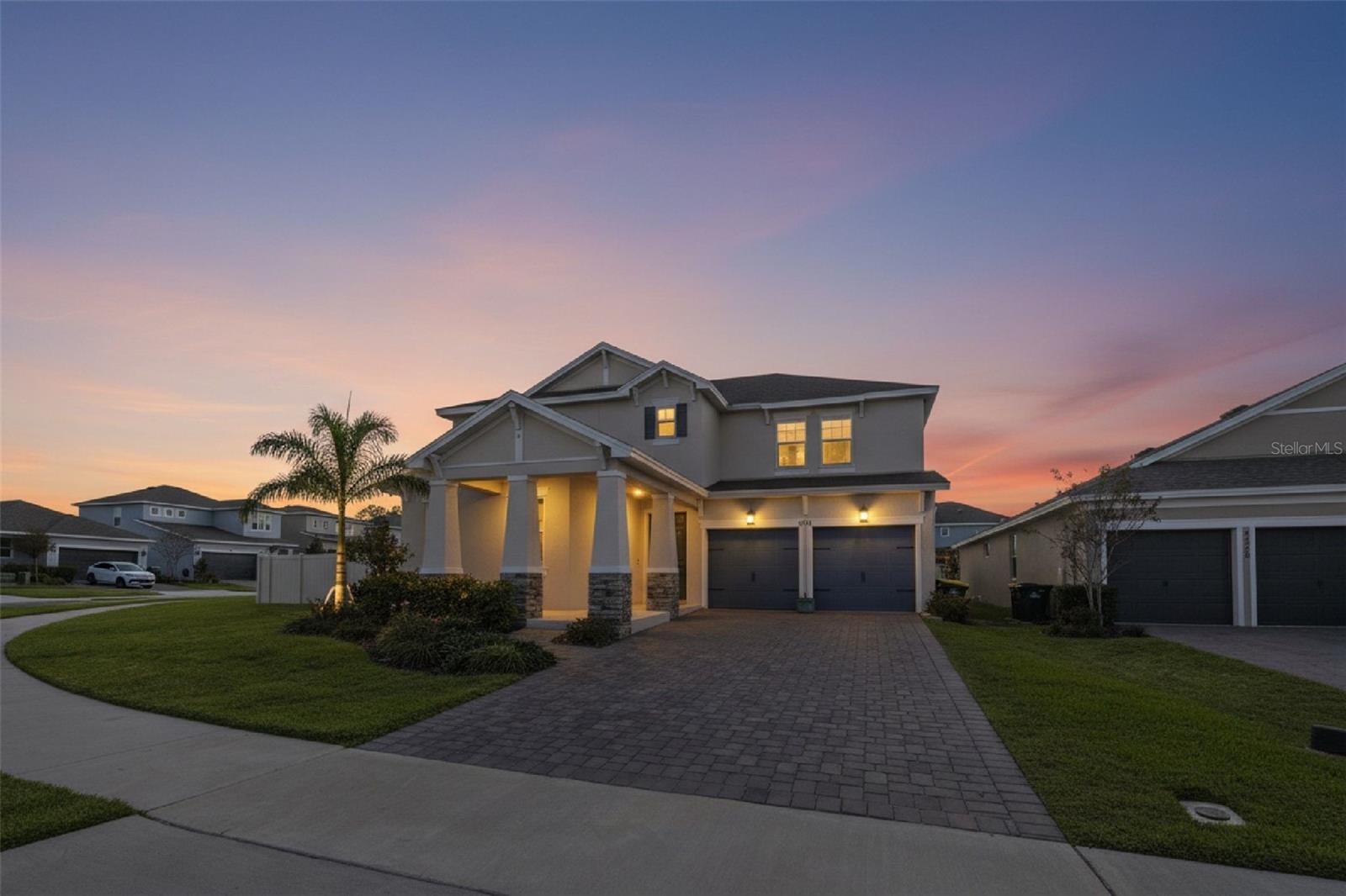 Better than New! Welcome to this beautifully appointed 5-bedroom, 3.5-bathroom POOL home featuring the desirable Captiva floorplan, built in 2023, and located in the sought-after Hartwood Landing community in the heart of Clermont—one of Central Florida’s most desirable and fast-growing areas. Situated on a large, fenced-in corner lot, this home offers an exceptional blend of space, privacy, and modern Florida living. Designed with today’s lifestyle in mind, the home showcases an open-concept floorplan with wood-style ceramic tile throughout the main level and luxury vinyl plank flooring on the stairs and second floor, delivering a cohesive, contemporary look with NO CARPETING throughout for easy maintenance. The versatile layout is ideal for multigenerational living, remote work, and entertaining. The gourmet kitchen serves as the heart of the home and features quartz countertops, a built-in stainless steel cooktop, wall oven, microwave, and premium refrigerator, offering both elegance and functionality for everyday living and hosting.The Primary Owner’s Suite, conveniently located on the main floor, provides a private retreat with a spacious walk-in closet and a spa-inspired owner’s bathroom highlighted by a large walk-in shower, large double-sink quartz countertop vanity, creating a relaxing and refined space. Upstairs, a loft area off the second-floor landing offers flexible space perfect for a media room, home office, or additional lounge area, while the secondary bedrooms provide comfort and privacy. Step outside to your private backyard retreat, where the pristine pool and expansive fenced yard create the ideal setting for relaxing weekends, entertaining guests, and enjoying Florida’s year-round sunshine. Hartwood Landing offers a community pool with cabanas, scenic walking trails and is ideally located near Wellness Way and the transformative Olympus Project, placing residents at the center of Central Florida’s newest wellness, sports, and innovation corridor. Residents also enjoy close proximity to Lake Louisa State Park, Walt Disney World, Horizon West and convenient access , arterial roads and major highways for seamless commuting throughout Clermont, Orlando, and surrounding areas. Located in Clermont, known for its rolling hills, scenic lakes, and strong sense of community, this home offers access to top-rated schools, shopping, dining, outdoor recreation, and charming downtown Clermont. This is a rare opportunity to own a nearly new, spacious pool home on a premium corner lot in a thriving community. Don't miss out. Schedule your private showing today.