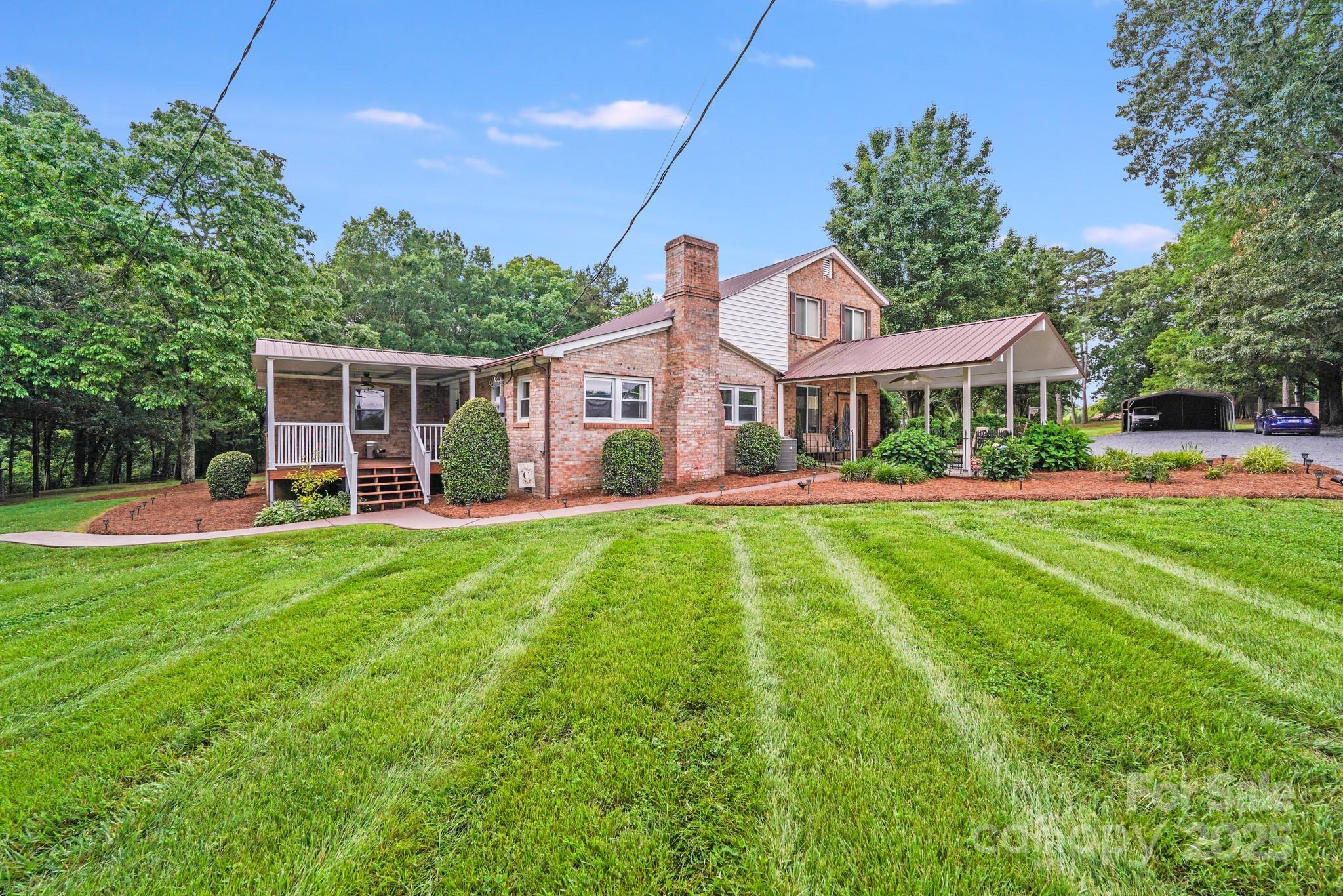 An exceptional property offering a personal paradise right in the heart of Locust.Truly a rare gem offering privacy,convenience & prime location in one stunning property A spacious home updated & tailored for entertaining relaxation & perfect for multi-generational living.Main home boasts 2980 sq ft & features a 1st floor Primary EnSuite, additional 3 bedrms,2 full baths,open kitchen,formal dining rm & 2 expansive living spaces-multiple covered porches & screened room Step outside to a private, park-like oasis, complete w/inground pool w/open & covered relaxation areas Car enthusiasts & hobbyists will appreciate the convenience of multiple garage/shop buildings w/gameroom/gym/office/private salon areas/abundant covered & gravel parking Adding to the unique appeal of the property is a detached guest suite -an independent quarters for extended family/teens & friends.Don't miss the opportunity to make every day feel like a getaway in this breathtaking amenity-rich & versatile property