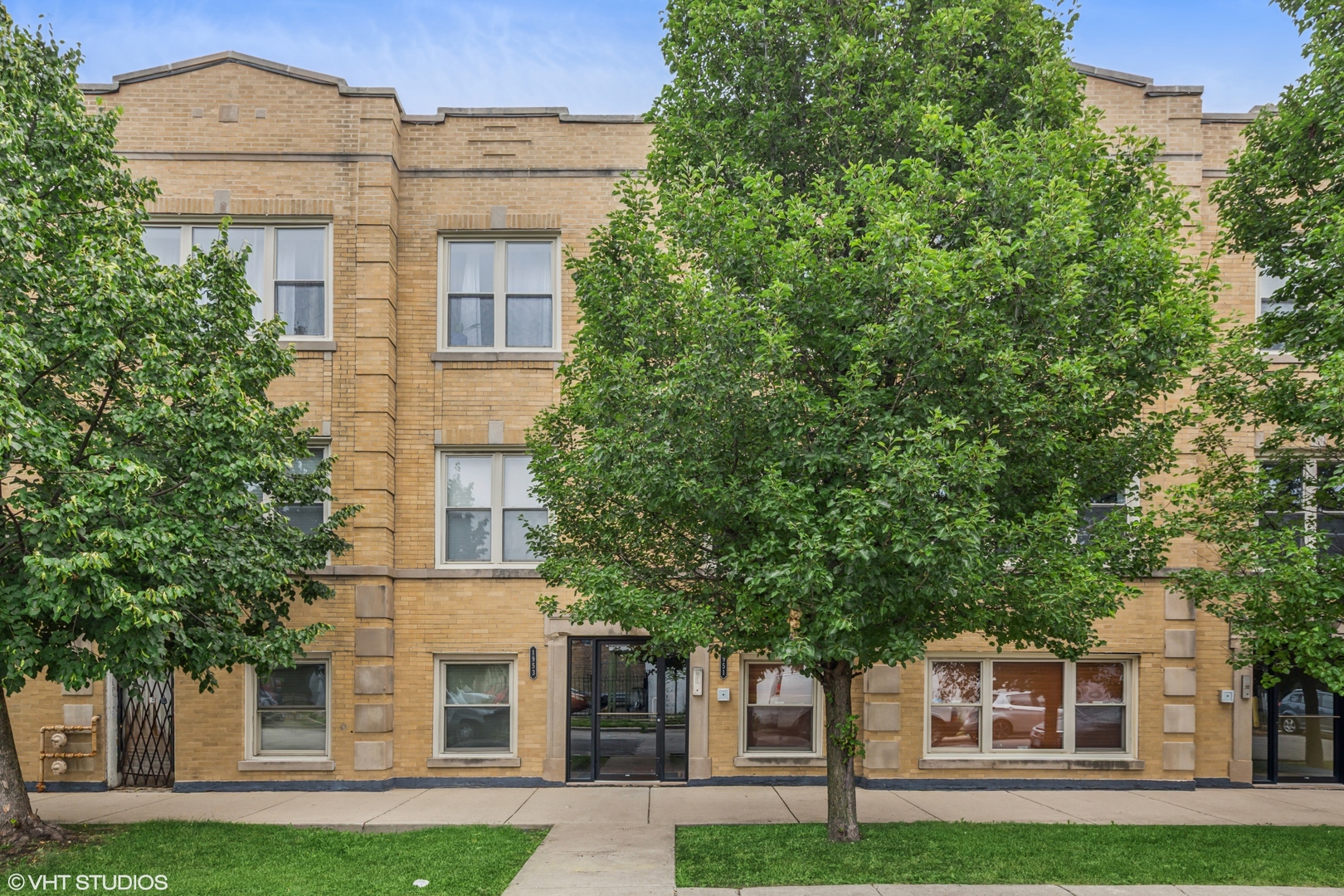 Stunning newer completely updated 2nd floor Two Bedroom/ One Bath Condo Near the 606 Trail.   Super bright unit features many large Windows and gleaming refinished oak hardwood floors throughout the living room as well as both bedrooms.  Elegant gas fireplace in the cozy living room with recessed lights, exposed brick wall and plenty of natural light.  Gorgeous kitchen with granite countertops, contemporary 42" cabinets and newer stainless-steel appliances.  Large spa-like bathroom with modern finishes.  Stylish primary bedroom features large picture window and ample closet spaces.  Second spacious bedroom could be used as guest bedroom or an Office.  Large deck is perfect for entertaining with friends and family or sipping coffee in the morning.  This gorgeous unit was just professionally painted throughout.  Easy permit street parking zoned for the building.  Great Logan Square neighborhood with lots of trendy restaurants, grocery stores, Mozart park, pickleball, 606 Trail and tons more. Metra train and CTA bus is right outside the entrance door. Professionally managed and agent owned.  ***Taxes DO NOT reflect homeowners exemption. ***