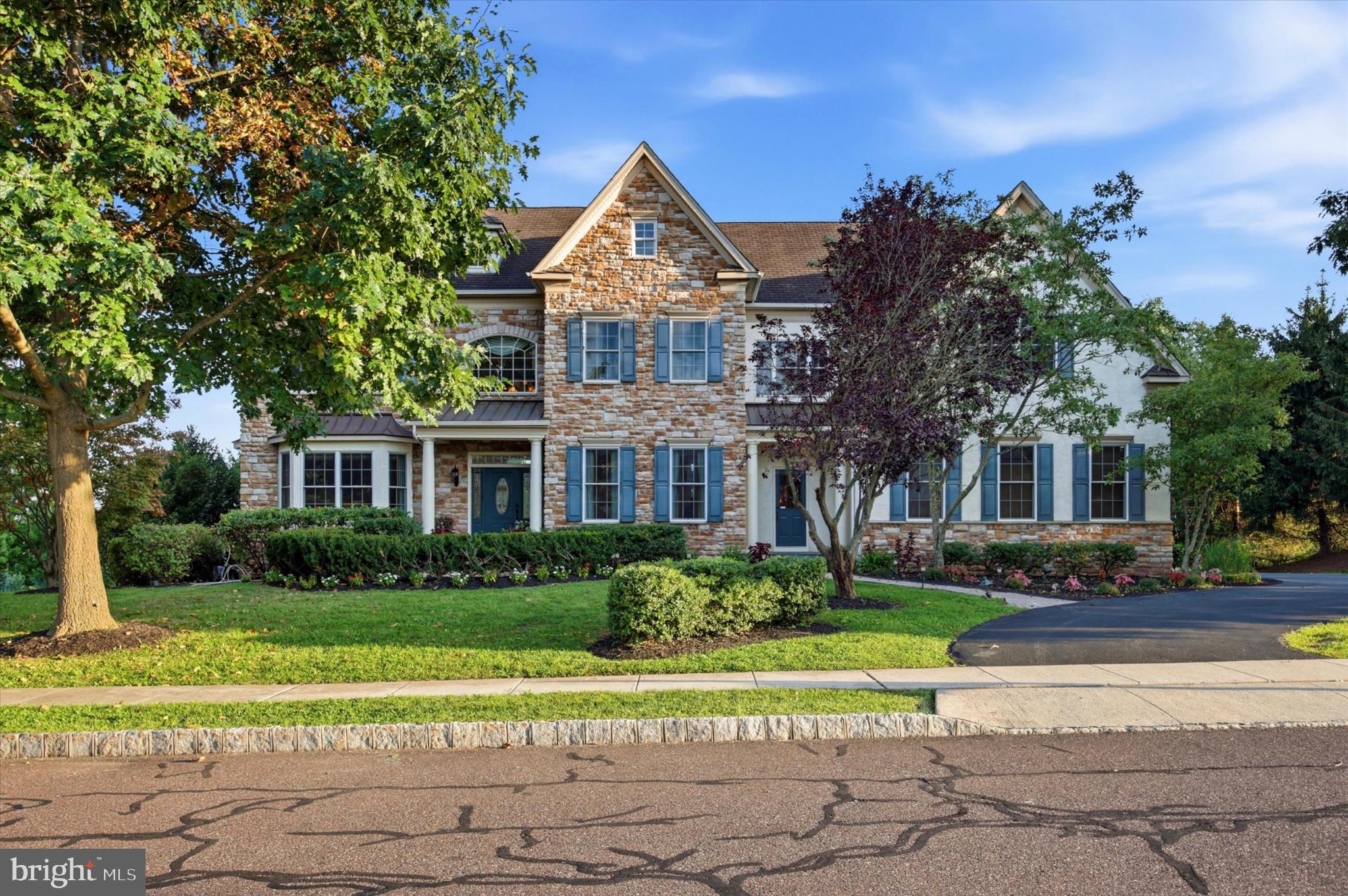 Welcome to 20 Meredith Drive, where timeless elegance meets modern comfort in one of Phoenixville's most desirable communities. From the moment you arrive, the stately exterior, elegant paver walkway, and impressive three-car garage set the tone for this exceptional home.Step inside to a dramatic two-story foyer that opens to an expansive, light-filled floor plan designed for both everyday living and elegant entertaining. Formal living and dining rooms provide sophisticated spaces for hosting, while the private home office, complete with custom built-in bookcases and French doors leading to a charming balcony, offers the perfect retreat for working from home or enjoying a quiet moment.At the heart of the home is the spectacular two-story great room, where soaring ceilings, walls of windows, and a floor-to-ceiling stone gas fireplace create a warm and inviting atmosphere. The gourmet kitchen is sure to impress, featuring a large center island, abundant cabinetry, 42-inch cabinets, gas cooking, a statement range hood, generous counter space, a Butler's pantry, and a sunny breakfast area with access to the spacious rear deck—ideal for outdoor dining, entertaining, or simply relaxing while overlooking the private backyard.The finished walk-out basement expands your living space with a second gas fireplace, a full bathroom, newer carpeting, and direct access to the backyard, making it the perfect for hosting large parties, recreation room, media room, home gym, or guest suite.Upstairs, you'll find generously sized bedrooms, including a luxurious primary suite designed as a private retreat, complete with a spacious sitting area and a beautifully appointed spa-inspired ensuite bath.One of the home's unique features is the versatile bonus space adjacent to the three-car garage, ideal as a private home office, creative studio, fitness room, hobby space, or additional storage—offering endless possibilities to fit your lifestyle.This meticulously maintained home also features a newly installed Lennox HVAC system, new carpeting on the main level, and new washer, dryer, and dishwasher, allowing you to move in with peace of mind.Conveniently located just minutes from the vibrant downtown Phoenixville scene, shopping, dining, parks, major commuter routes, and the award-winning Spring-Ford Area School District, this exceptional home offers the perfect combination of luxury, functionality, and location.A rare opportunity to own a truly exceptional home that has been thoughtfully updated and beautifully maintained—schedule your private tour today!