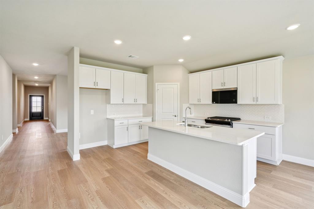 Brand new, energy-efficient home available by Oct 2025! Sip your morning coffee at the Henderson's convenient kitchen island overlooking the dining and family rooms. In the primary suite, elegant sloped ceilings complement the sizeable space, including ensuite with dual sinks and large walk-in closet. Escape the bustle of the city without being too far from the action. Beat the summer heat at the neighborhood amenity center complete with a resort-style pool. Zoned in the sought-after Crowley ISD, Tesoro at Chisholm Trail Ranch offers six floor plans to fit your family’s lifestyle. We also build each home with energy-efficient features that cut down on utility bills so you can afford to do more living.*  Each of our homes is built with innovative, energy-efficient features designed to help you enjoy more savings, better health, real comfort and peace of mind.