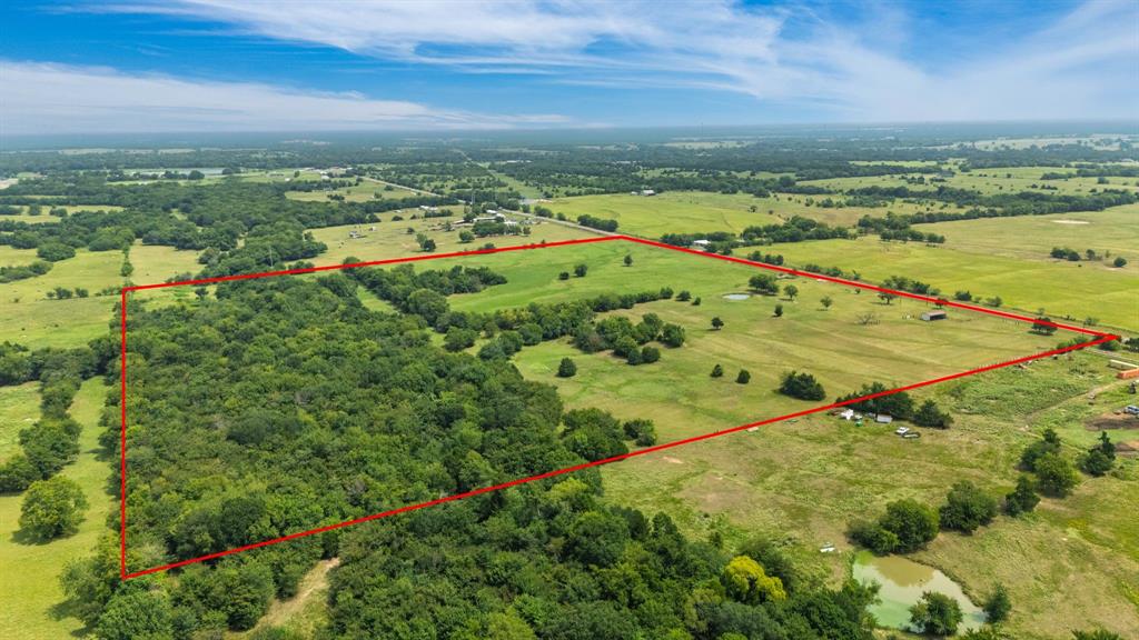 Immaculately maintained 47 acres, with AG-exemption, can be found just south of Interstate 30 in Cumby! This scenic acreage comes with available water and electric (already on site) and lots of road frontage that can easily be subdivided into smaller tracts. High-speed internet is also available per seller. A wooded area provides a beautifully treed spot for that new home site! Two older septics are also on site. Fencing and cross-fencing allows you a secure place for livestock. Plus grassy pastures, 3 ponds, and a creek give you plenty of resources for animals. Stock the ponds with fish and viola'--you have the ideal place for all your weekend recreation or full-time living. You'll discover this idyllic place within commuting distance from Dallas. Located between the bustling small town of Sulphur Springs to the east and Greenville to the west, build your dream home in the country while being close to city amenities and a variety of community activities!