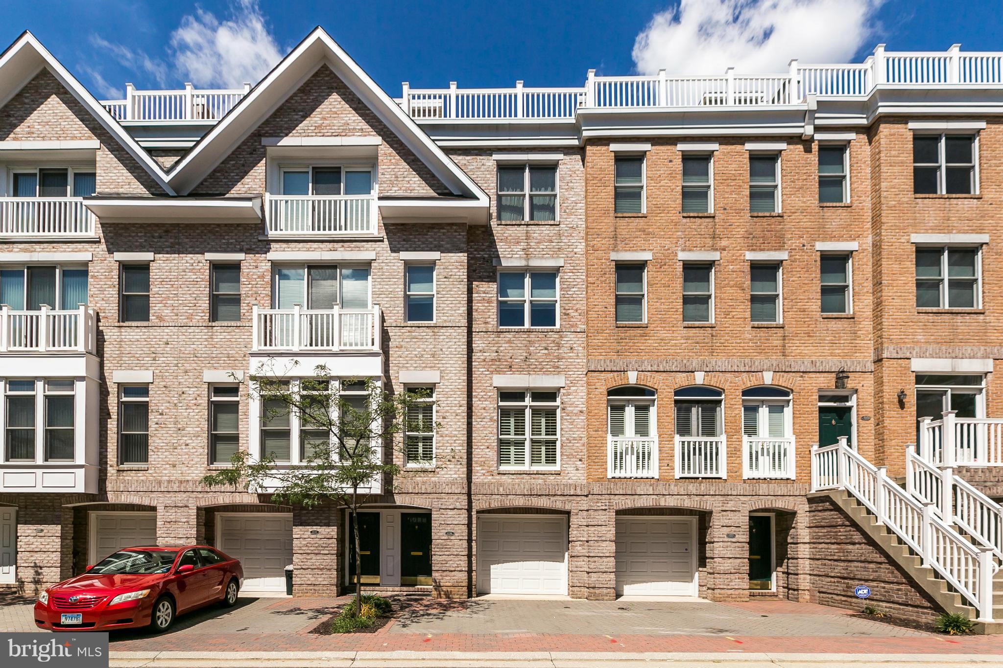 Envision your new lifestyle within the distinguished Harborview Community.  This pristine town home features an impressive contemporary floor plan with over 2,400 square feet of luxury living spread out on over five levels.  This coveted true four bedroom home floor plan offers exquisite finishes including stainless steel appliances, gas cooking, quartz counters, custom backsplash, plantation window shutters, crown molding, hardwood flooring & rear balcony.  Enjoy the water and city skyline views from the spacious rooftop terrace with plenty of room for outdoor entertaining.  The enclosed ground level patio area provides plenty of room for gardening projects.  Parking for three vehicles is provided for within the attached one car garage and two car parking pad.  Community amenities include 24/7 security & on-demand security escorts, a guest parking lot (paid daily or monthly parking options available), outdoor pool, private fitness center, monthly water bill, private trash & snow removal, marina, Dock bar, Italian deli & market and beautifully landscaped grounds. A conveniently located water taxi can take you to explore any neighborhood in the city. With countless shopping, dining and entertaining options just minutes away from this centrally located Inner Harbor property you can enjoy a lifestyle offered nowhere else in Baltimore.