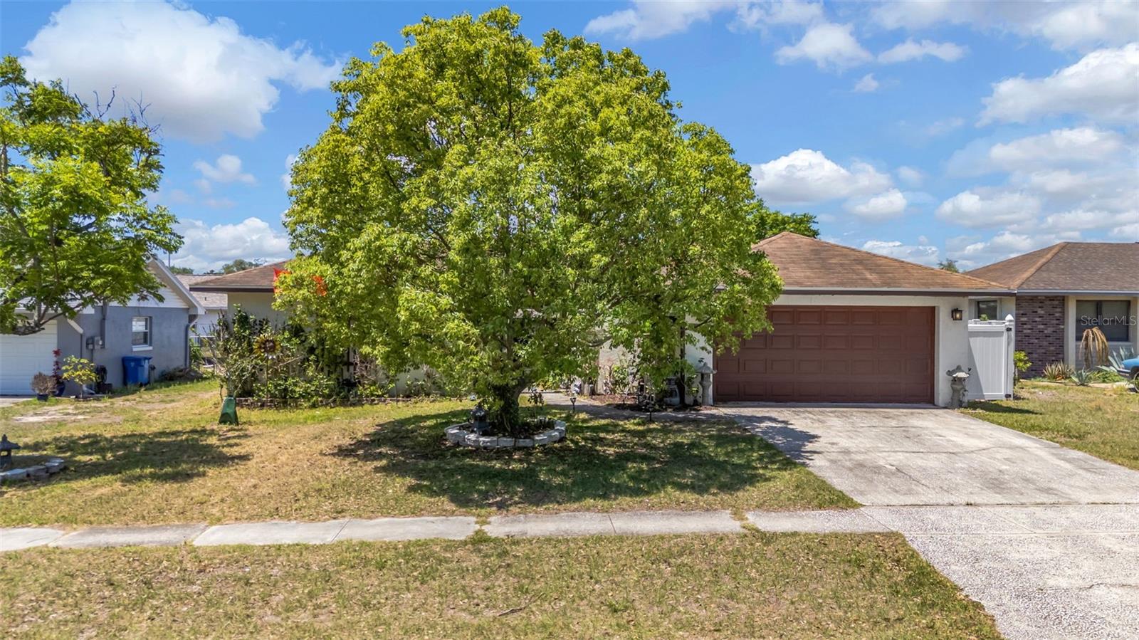 3/2 single-family home in Brandon with 2-car garage and 1,643 sq ft. No HOA. Flood Zone X. Roof 2018, panel 2021, windows 2022.  3 bedroom, 2 bathroom single-family home in Brandon with a 2-car garage and 1,643 heated square feet. No HOA. Located in Flood Zone X, with roof replaced in 2018, electrical panel in 2021, and double-pane windows installed in 2022. Built in 1978 and set on a 7,000 sq ft lot, the property offers public utilities and a clear history of updates that help reduce near-term maintenance concerns. Inside, the home features vinyl flooring installed in 2021 and interior paint completed the same year. The hall bathroom was remodeled in 2021, and blown-in attic insulation was added to improve energy efficiency. Kitchen appliances were updated in 2025, providing a more current setup for daily use. Additional system and exterior updates include a garage door replacement in 2021, along with gutters and soffit replaced in 2025. These improvements contribute to overall functionality and upkeep. The covered lanai extends the living space outdoors, offering a practical area for seating or everyday use. The 7,000 sq ft lot provides manageable outdoor space with flexibility for future customization. Located in the heart of Brandon, the home offers convenient access to shopping, dining, and everyday services. With documented updates, public utilities, Flood Zone X designation, and no HOA, this property presents a practical option for buyers seeking an updated home with key improvements already completed.