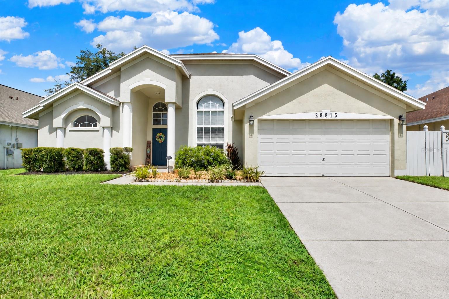 This beautifully updated three-bedroom, two-bathroom pool home with a private office combines modern comfort, flexible living space, and exceptional value in the heart of Wesley Chapel. Inside, luxury vinyl flooring extends throughout the home, complemented by a beautifully updated guest bathroom with contemporary finishes. The dedicated office provides the ideal space for remote work or a study. The true highlight is the outdoor living area. Enjoy your private screened-in pool and expansive covered lanai, an impressive space for morning coffee, weekend gatherings, outdoor dining, and relaxing evenings at home. Additional features include an electric-vehicle charger in the garage, highly regarded local schools, a low HOA fee, and NO CDD fees. With convenient access to Wesley Chapel’s popular shopping, restaurants, entertainment, and major highways, this home delivers the perfect balance of comfort, convenience, and Florida living.