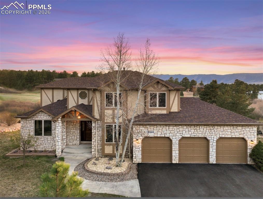 Tucked at the end of a quiet cul-de-sac & backing to open space & walking trails, this beautifully updated ONE -OWNER home offers sweeping mountain views, privacy & a setting that stands out from the rest * From the moment you enter, you’re welcomed by the tile entry & striking curved staircase, setting the tone for the quality & updates you'll find thru-out * Main level features all new flooring, fresh interior paint & light-filled layout with a spacious living room flowing into a formal dining area with updated lighting. & ceiling detail * Kitchen has been refreshed with new granite countertops, sinks, faucets, stainless steel appliances with generous eating nook opening seamlessly to a large family room, creating an ideal space for both everyday living & entertaining * Main-level 5th bedroom adds flexibility for guests, office use or multi-generational living * Upstairs, the primary suite is generously sized with expansive mountain views, large walk-in closet & updated finishes including new flooring, lighting & hardware * Three additional bedrooms with ample closets & full bath complete the upper level * The walk-out basement is insulated & ready for future finish, complete with a bathroom rough-in & multiple functional spaces, offering excellent potential for additional living area, recreation or storage * A true standout feature is the expansive covered deck spanning the entire back of the home, designed to take full advantage of the massive views * The space includes a glassed-in / covered section with a built-in firepit & gas grill, creating an incredible setting for year-round outdoor living & entertaining * Additional highlights include a brand new asphalt driveway, new exterior coach lighting, stucco & extensive stone exterior that enhances curb appeal * A rare opportunity to own a move-in ready home with updates, views & exceptional indoor-outdoor living in a highly desirable setting * Normally only available in much higher price points, true WOW house!