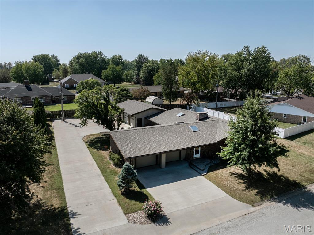 Space, space, and more space! 2,300+ sq ft on the main floor and 1,700+ finished in the basement (that also has a full kitchen and full bath with laundry). Vaulted ceilings. Tall stone double sided fireplace. And 1,660+ sq ft in two attached garages. This ranch home on the prestigious Johnson Place in Palmyra has SPACE! The main floor is perfect for entertaining or cozying up next to the fireplace. There is tons of concrete to ride bikes or host a large gathering, and a big backyard for all kinds of fun. Check out this perfect home before it's too late!