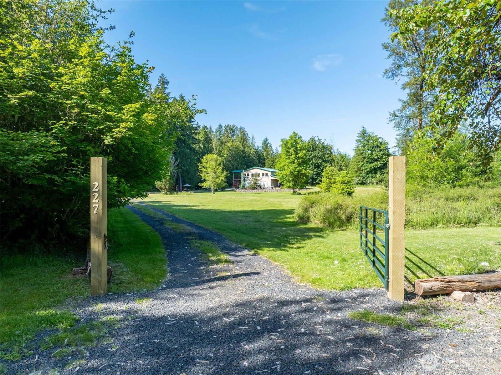 Riverfront on the Cowlitz River and the kind that rarely comes up! Five gated, private acres with your own steelhead and salmon water to fish to your hearts content. Just follow the path down from the main home to the bank to fish, camp, and gather. This 2014 built home keeps everything under one roof. The entire ground level is a 3-car insulated shop with a workspace, a bedroom, full bath, and a laundry room. Giving you room for every toy and tool, plus guest space or a spot to clean up after a day outdoors. The main living area upstairs is an open layout with granite, hickory cabinets, hardwood floors, a walk-in pantry, and a covered Trex deck overlooking the open, wooded grounds. Add covered RV parking, garden space, and room to roam. Peace of mind comes built in with an automatic whole-home generator thats runs on propane from your owned propane tank, a well, water filter and softener, heat pump, central A/C, security system, fiber-optic internet and even a cell phone booster. It also has a metal roof, metal siding and LeafGuard gutters which means less upkeep, more living. Bring your boots and fishing rod because this property earns a visit!