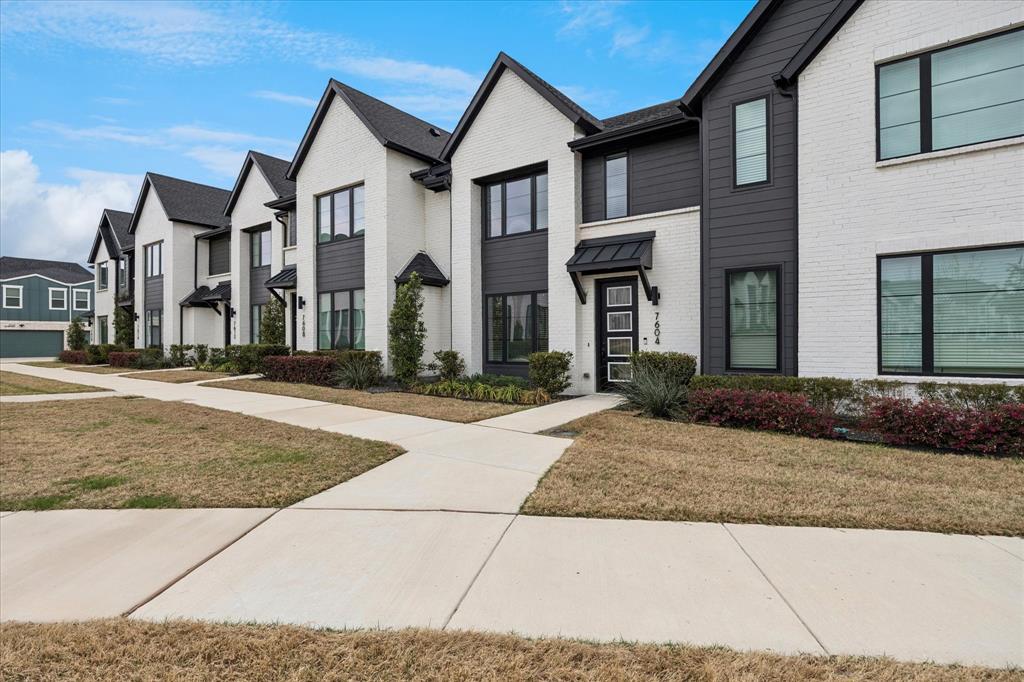 Experience modern comfort and energy efficient living in this stunning CADENCE HOMES - BELLA floor plan townhome, located in the desirable Urban Trails community of North Richland Hills. This like new interior unit offers a tranquil pocket park view right across the street, combining serenity with unbeatable convenience in the heart of the DFW Metroplex. An inviting open concept layout showcases a fresh grey and white palette, abundant natural light, and seamless flow between living, dining, and kitchen spaces.The oversized eat in kitchen includes 42 inch upper cabinets, granite countertops, a gas range, Frigidaire stainless steel appliances, a large walk in pantry, new drawer pulls and exceptional storage. The main floor also includes a convenient half bath for guests. An open spindle staircase leads to two spacious owner’s suites, each with its own private en suite bathroom—ideal for guests, roommates, or flexible living arrangements. Additional features include a tankless water heater, energy efficient appliances, and an oversized garage for extra storage with epoxy flooring.Residents enjoy walking and biking trails located just behind the community, along with low maintenance living thanks to an HOA that maintains all exterior care. Located in Birdville ISD and just minutes from shopping, dining, entertainment, and the TexRail station with direct access to DFW Airport, this move in ready home offers the perfect blend of comfort, style, and convenience. Care has been taken to provide accurate info but buyers and buyers agents please verify all measurements schools and taxes.