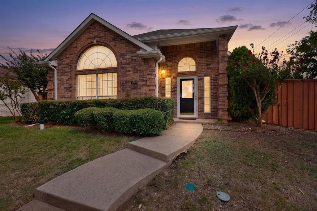 Adorable home located in highly sought-after Plano ISD. This adorable home features hardwood floors, a cozy wood-burning fireplace, and a wet bar in the main living area. Plantation shutters add charm and natural light throughout.The spacious primary suite offers a vaulted ceiling, dual vanities, a large garden tub with separate shower, and an oversized walk-in closet. The kitchen is designed for both function and style with a large island, granite countertops, and an upgraded backsplash.Additional highlights include an oversized laundry room, upgraded fixtures, and ceiling fans in all bedrooms and the living area.