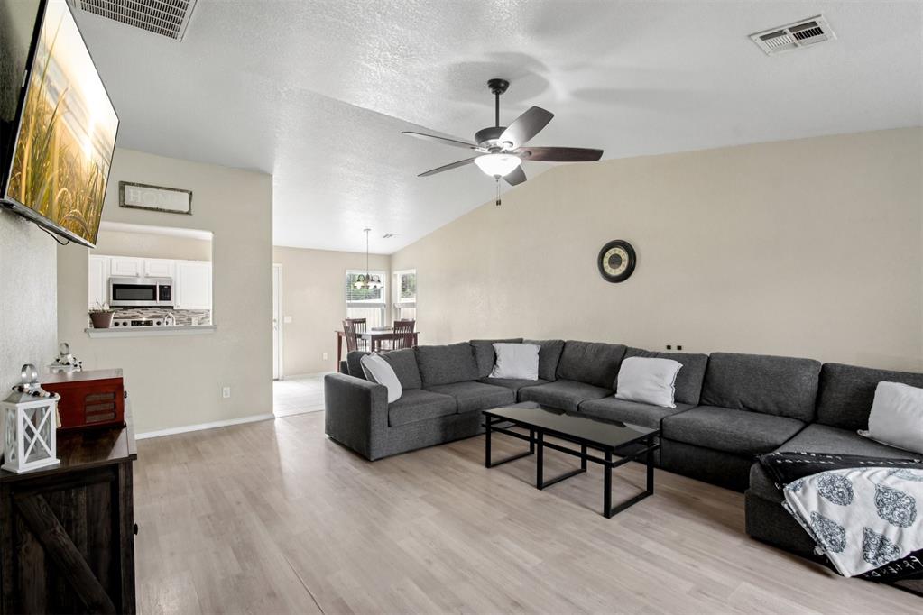This well-maintained 3-bedroom, 2-bathroom home offers comfort, updates, and a convenient location near Tinker Air Force Base. The spacious living room provides plenty of room to relax or entertain, while the kitchen features a pantry and durable concrete countertops. Luxury vinyl flooring runs throughout much of the home, adding style and easy maintenance. The backyard is fully fenced and generously sized—great for outdoor activities or pets. A storm shelter is located in the garage for added peace of mind. Major updates include a new roof and a new AC unit. The back door and rear siding will be updated before closing. Enjoy quick access to the freeway and proximity to shopping, dining, and other amenities.