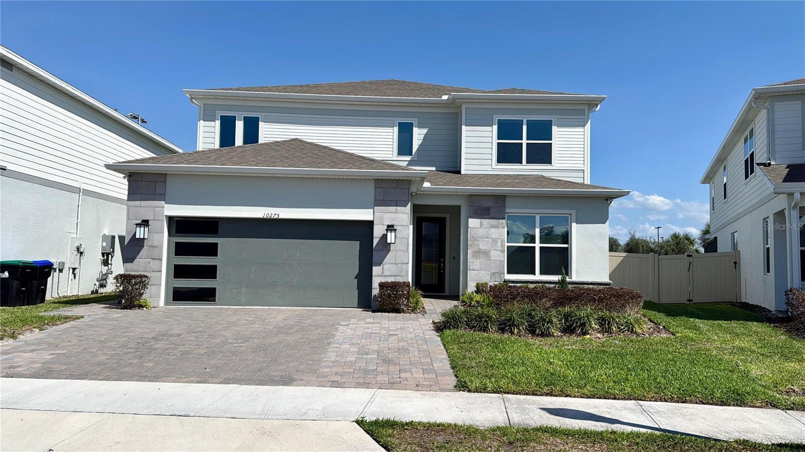 Stunning Yorkshire floor plan built by Pulte Homes in 2024, located in the HIGHLY DESIRABLE Parkview Reserve community in the HEART OF DR. PHILLIPS. This exceptional home includes OVER $230K IN UPGRADES, including gutters, a garage storage system, custom blinds, and a FULLY COMPLETED LUXURY POOL, outdoor kitchen plumbing, pool electrical wiring, and installed exterior security cameras. Furniture is negotiable.This spacious two-story estate home offers 5 BEDROOMS, 4 FULL BATHROOMS, a powder room, a home office, a flex/game room, a large loft, a covered lanai, and a 2-car garage. Designed for comfort and functionality, the OPEN-CONCEPT LAYOUT is perfect for entertaining.The gourmet kitchen features built-in appliances, a walk-in corner pantry, upgraded stacked white cabinetry, quartz countertops, a mosaic backsplash, under-cabinet lighting, and pendant lighting over the large center island.The main level includes a GUEST SUITE with a private bathroom and walk-in closet, a dedicated home office, and a flex room. Upstairs, you’ll find a spacious loft, a laundry room with quartz-topped cabinetry, an additional guest suite, two secondary bedrooms, a full bathroom, and the owner’s suite, which features a SPA-INSPIRED WALK-IN SHOWER with a rain shower head, dual vanities, a private water closet, a large walk-in closet, and a linen closet.Designer upgrades include a stone-accented exterior, glass-inlay front door, tile flooring in the main living areas and bathrooms, stain-resistant carpet in the bedrooms and second floor, oak stair rail with iron spindles, upgraded trim and baseboards, and completed outdoor kitchen plumbing and pool electrical wiring.The BRAND-NEW PRIVATE POOL is fully completed and ready to enjoy, featuring a spa (hydromassage), waterfall, gas heater, and bubble system—creating the perfect BACKYARD RETREAT.This home is also backed by the BUILDER WARRANTY from PulteGroup, with up to 9 YEARS REMAINING on many items.Parkview Reserve features private homesites with pond and conservation views, NATURAL GAS, LOW HOA, NO CDD, and an UNBEATABLE LOCATION just MINUTES FROM INTERSTATE 4, O-TOWN WEST, DR. PHILLIPS COMMUNITY PARK, Orlando’s world-famous theme parks, and the renowned dining, shopping, and entertainment of RESTAURANT ROW.