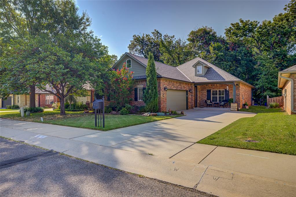 Discover a harmonious blend of comfort and style.  A single family one owner residence built in 2007.  This attractive property is in great condition, offering an inviting atmosphere for refined living and 2 Primary Suites.  The kitchen is designed for both culinary exploration and effortless entertaining, featuring stainless steel appliances and a functional island. Retreat to a bathroom designed for rejuvenation, complete with a walk-in shower. The low maintenance  private back yard provides a serene escape, perfect for evening gatherings and backs to greenbelt.  Convenience is key with a dedicated laundry room and an oversized attached two-car garage.  No more moving heavy boxes into the attic with the Versalift  automated attic lift system.  Extend your living space outdoors with a covered patio, ideal for enjoying the Oklahoma weather. This residence offers a lifestyle of ease and enjoyment, ready for you to make it your own.  Flex room could be extra bedroom, office, etc.  Walking distance to Hallbrooke swimming pool and clubhouse.
