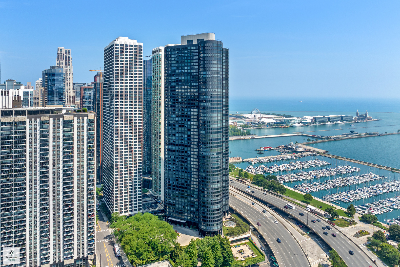 Rarely available 1 Bedroom 1.1 Bath home in Harbor Point's "09" tier. Set in the easternmost curve, unobstructed lakefront views span Navy Pier to Michigan and Indiana, the Chicago skyline, Museum Campus, Grant Park, Buckingham Fountain, Chicago Yacht Club and more landmarks to the west. Twice weekly lakefront fireworks May-August. Thoughtfully renovated in 2022. Light contemporary kitchen cabinets with full height aquamarine backsplash, quartz countertops, island with pull-outs and seating space, stainless appliances, double bowl under mount sink, recessed cabinet & ceiling lighting. Custom bi-fold kitchen doors allow for formal flow. The bedroom en-suite bath (2017 remodel) features a custom glass-enclosed shower with floor-to-ceiling marble surround, glass shelving & marble flooring which extends into the efficiently designed home office/walk-in closet. Washer/dryer hookups in linen closet. Custom paint and lighting. Window seat storage (new window seat tops), generous closet space & additional storage cage. Harbor Point's full-service amenities include indoor pool with lap lane, hot tub, exercise facility & weight room, steam and sauna room, racquet ball/basketball/pickleball/ping pong courts, two outdoor sundecks with gas grills, seating, lounge chairs and hammocks, Bockwinkel's grocery open till 11 PM, 24-hour door-staff, bike room, dry cleaners, on-site garage with visitor parking and car wash, laundry with library, two party rooms and children's play rooms. Prime Lakeshore East location steps to Maggie Daley & Millennium Park, rollerblading & ice skating ribbon, playgrounds, tennis courts, Mariano's grocery & world-class shopping & dining. CTA #60 bus stops in front of the building. Basic cable and internet included in assessments. Parking is rental and available. 25lb pet weight limit. 1 dog only, 2 pet limit. Strong reserves, never a special assessment.