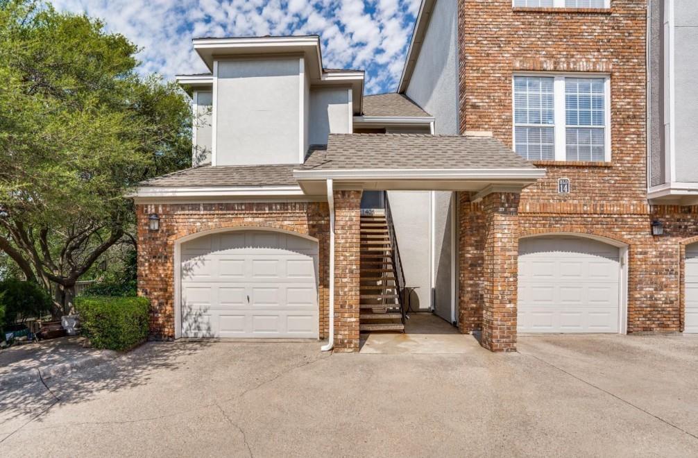 Beautiful Low Maintenance Townhome in Highly Sought After Montfort Townhomes. Welcome to this bright & inviting 2 bedroom, 2.5 bath end unit townhome located in the desirable gated Montfort Townhomes community.The spacious open concept living area is filled with natural light & features a wood burning fireplace, dry bar with wine fridge and plenty of space for a home office. The kitchen boasts granite countertops, tile backsplash & stainless steel appliances. The laundry room is conveniently located just off the kitchen complete with full size washer & dryer, pantry & extra storage space. A half bath off the living area is perfect for guests & entertaining.The primary suite offers vaulted ceilings & an ensuite bathroom with granite countertops, tile floors & a relaxing garden tub. Secondary bedroom with an adjacent updated full bath.Additional highlights include ample storage throughout, a large storage closet at the entry of the home & a 1 car garage with an oversized walk in storage area ideal for bikes, kayaks or other large items.Enjoy the convenience of an established gated community with a community pool, water, trash & maintenance included in HOA, ample parking & low insurance costs. Centrally located in the heart of Addison with quick access to major highways, tollways & airports. Quick walk to Celestial Park, White Rock Creek Trail (paved), Village on the Parkway & countless restaurants & entertainment options.This home qualifies for a lender-paid 2-1 buy down with a 5.045% interest rate, offering reduced monthly payments for the first two years at no cost to the buyer or seller.