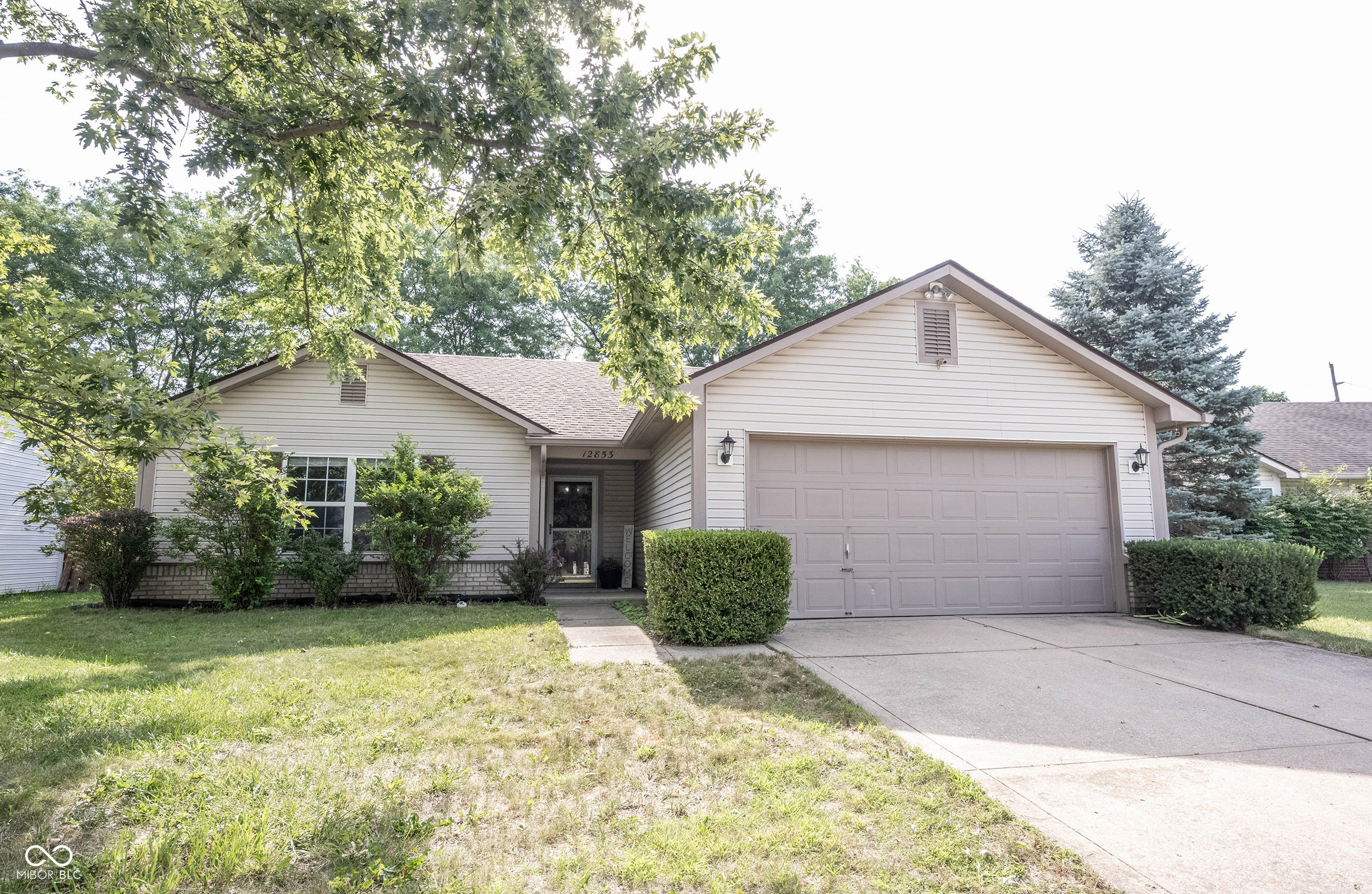 Welcome to 12853 Longleaf LN, in Fishers, IN. Built in 1997, this inviting home is ready for you to move in and begin your next chapter. This traditional ranch-style property offers a covered front porch, raised ceilings, solid surface LVP flooring, effortless maintenance, and a great eat-in kitchen. The kitchen has lots of natural light, open-concept views to the great room, and backyard. Lots of cabinet storage, stainless steel appliances, and a double pantry. Having the patio and pantry off the kitchen makes for easy grilling, serving, and clean up! This home offers three comfortable bedrooms, each providing their own walk-in closet. The primary suite is spacious and includes a larger walk-in closet and an ensuite with tub/shower combo and vanity. Notice the park-like backyard for outdoor enjoyment, play and relaxation. Imagine evenings spent around the fire pit, creating lasting memories. The garage, convenience with a work station and extra storage! Laundry with washer and dryer included. Fantastic Hamilton Southeastern Schools, easy access to SR37, I69, dining, restaurants, and entertainment. Schedule your private showing today!