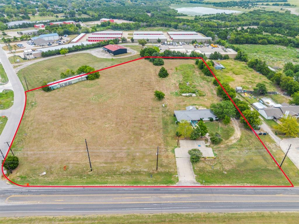 4.80 Acres on this Busy Corner Location with 2 Lots Combined. This is an Amazing Location for a Medical Practice, Dental, Retail Strip, Restaurant or any business. Being Sold For Land Value. Buy one (2.308) tract or both (2.491) to include 4.80 Acres. Demo the 2115 SF building or remodel. The corner lot includes a green barn at 2832 SF at the back. Close to Presbyterian Hospital, Pullen & Cain School and across from Buffalo Creek Subdivision and Golf Course. Quick access to Hwy 30 & HWY 205. Buyer and Buyer's agent to verify all info. There are 2 parcels at this address & Ranch Trail. 
Mls# 20948088 and 20948158.