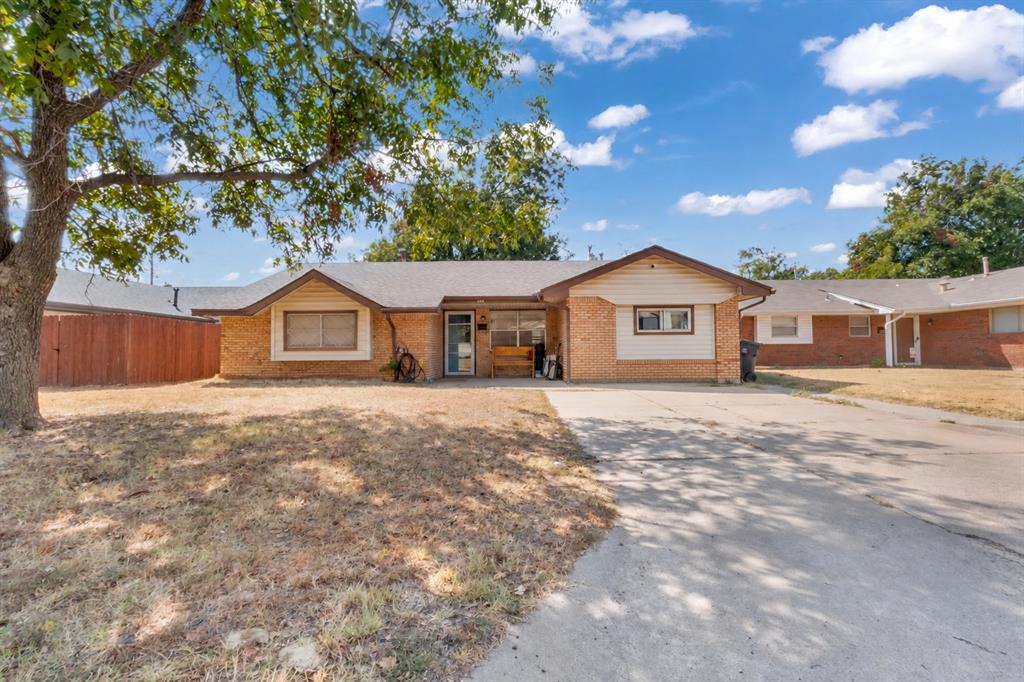 More space, more possibilities, and move-in ready! This well-kept home offers 4 bedrooms, 2 bathrooms, and a converted garage that can easily serve as a 4th bedroom, home office, game room, or flex space. Inside, you’ll love the natural light, wood-look floors, and vaulted living area with exposed beams and a statement barn door. Step outside to a fully fenced backyard with a covered patio—perfect for cookouts, pets, and relaxing evenings. With flexible living space, plenty of character, and room to make it your own, this one is ready to welcome you home!