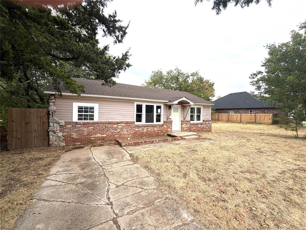 Welcome to 611 NW 95th, a 3-bedroom, 1-bathroom home offering a functional floor plan and plenty of potential. The home features wood flooring in the living room, hallway, and two bedrooms, adding character and a warm feel to the main living areas. An inside laundry area provides added convenience, while the former 1-car garage has been converted to a third bedroom and is included in the square footage reported in the MLS. The layout provides a nice starting point for someone looking to make the space their own, with opportunities to add updates and personal touches throughout. Conveniently located in Oklahoma City with easy access to area amenities, shopping, dining, and major roadways, this property is ready for its next chapter.